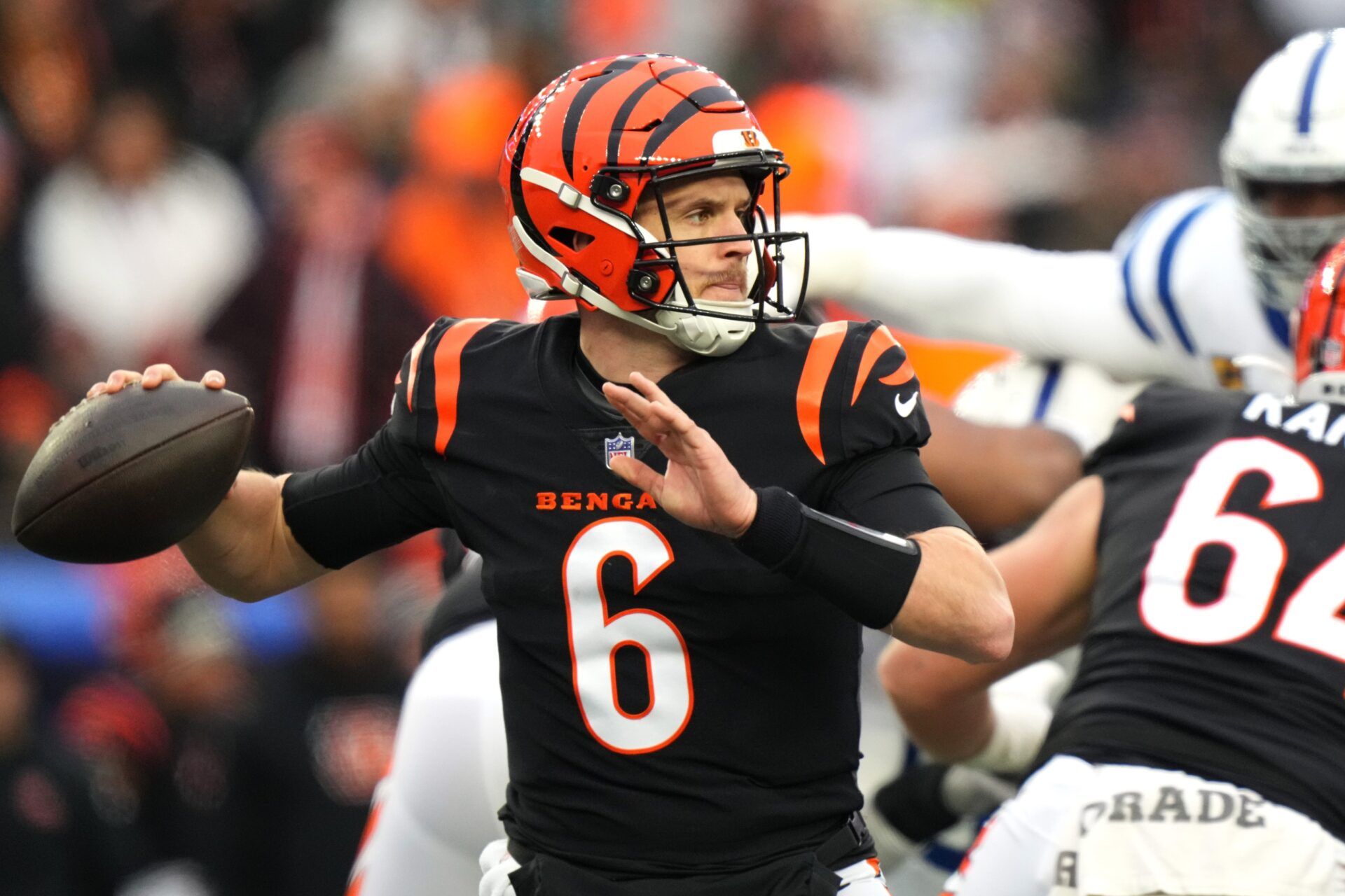 Jake Browning (6) throws in the second quarter during a Week 14 NFL game between the Indianapolis Colts.