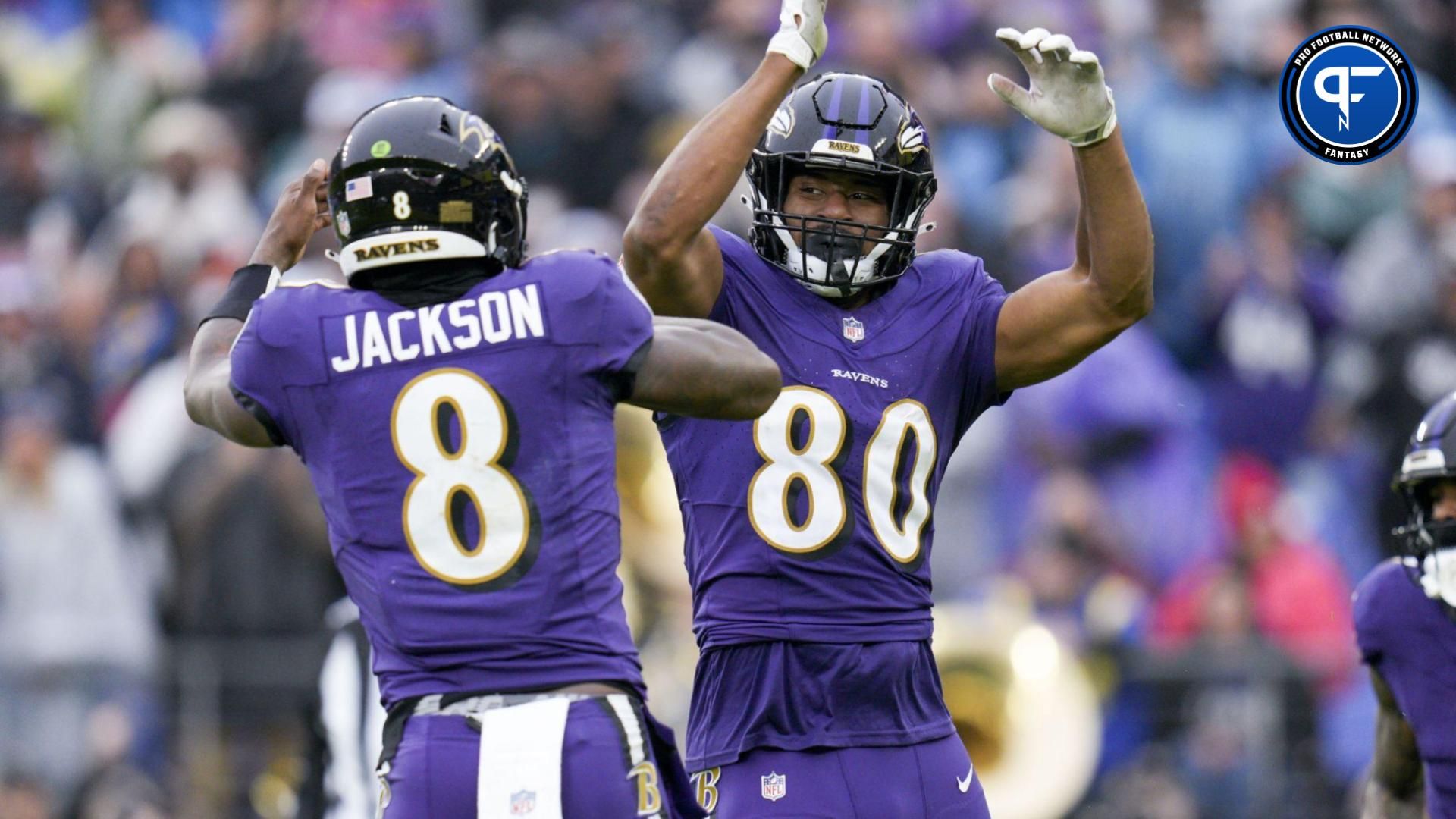 Baltimore Ravens tight end Isaiah Likely (80) celebrates a touchdown with quarterback Lamar Jackson (8) against the Los Angeles Rams during the first quarter at M&T Bank Stadium.