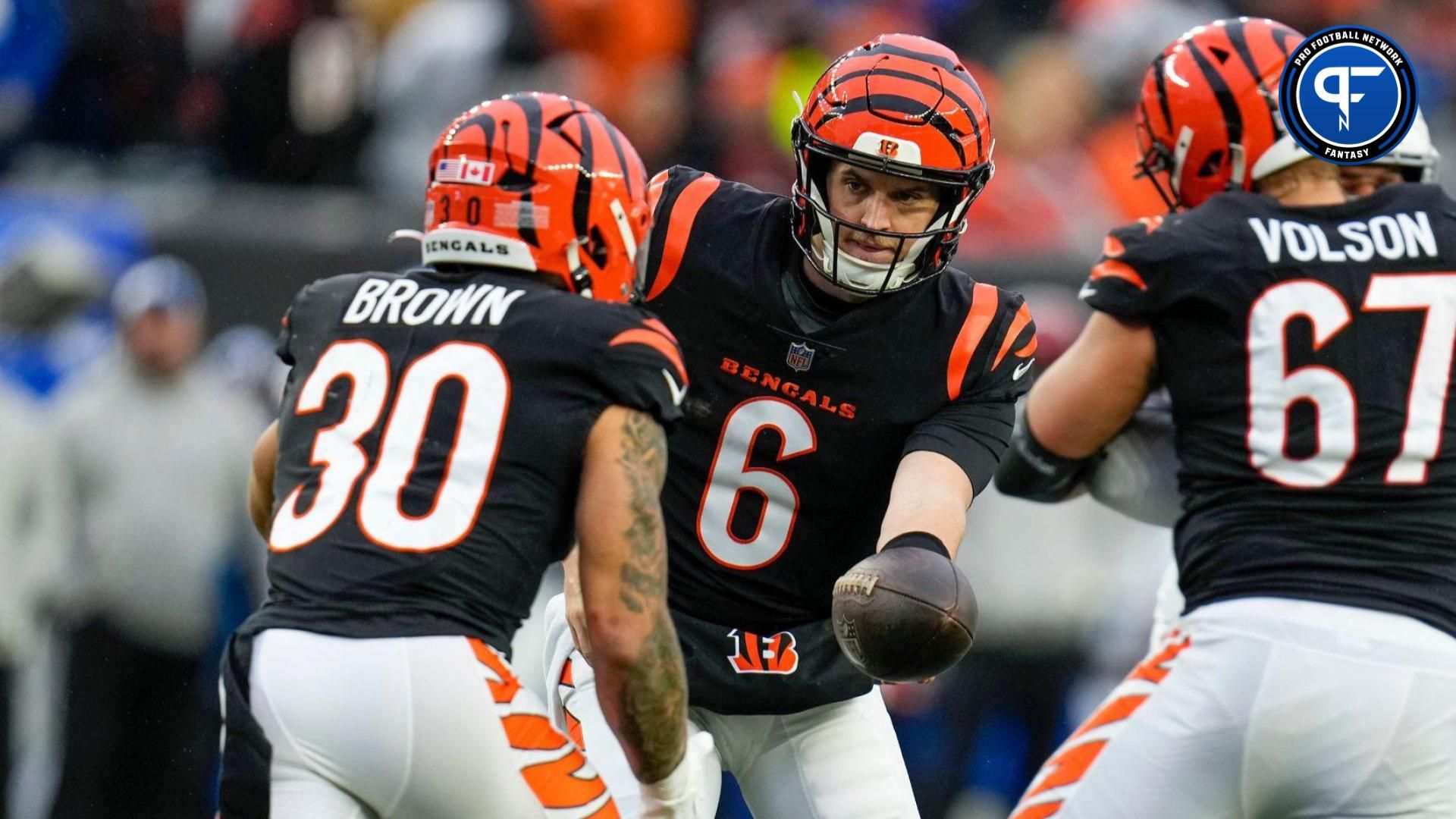 Cincinnati Bengals quarterback Jake Browning (6) hands off to Cincinnati Bengals running back Chase Brown (30) in the 3rd quarter against the Indianapolis Colts Sunday, December 10, 2023, at Paycor Stadium in Cincinnati.