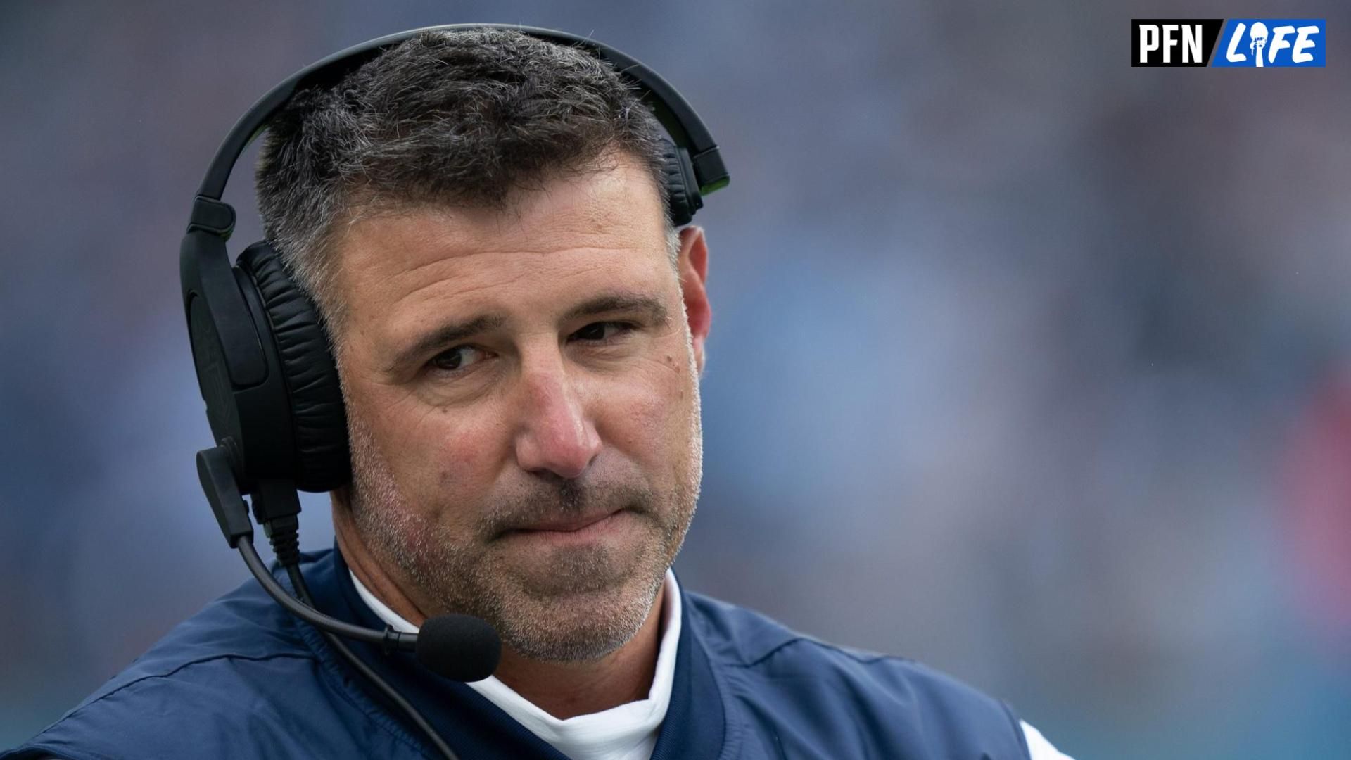 Mike Vrabel waits for a referee's decision after throwing the challenge flag against the Carolina Panthers during their game at Nissan Stadium.