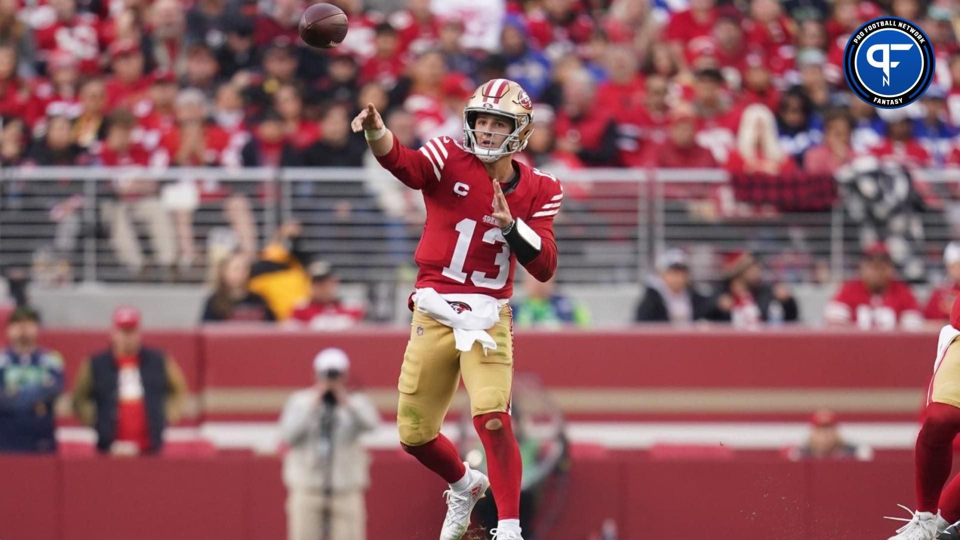 San Francisco 49ers quarterback Brock Purdy (13) throws a pass against the Seattle Seahawks in the fourth quarter at Levi's Stadium.