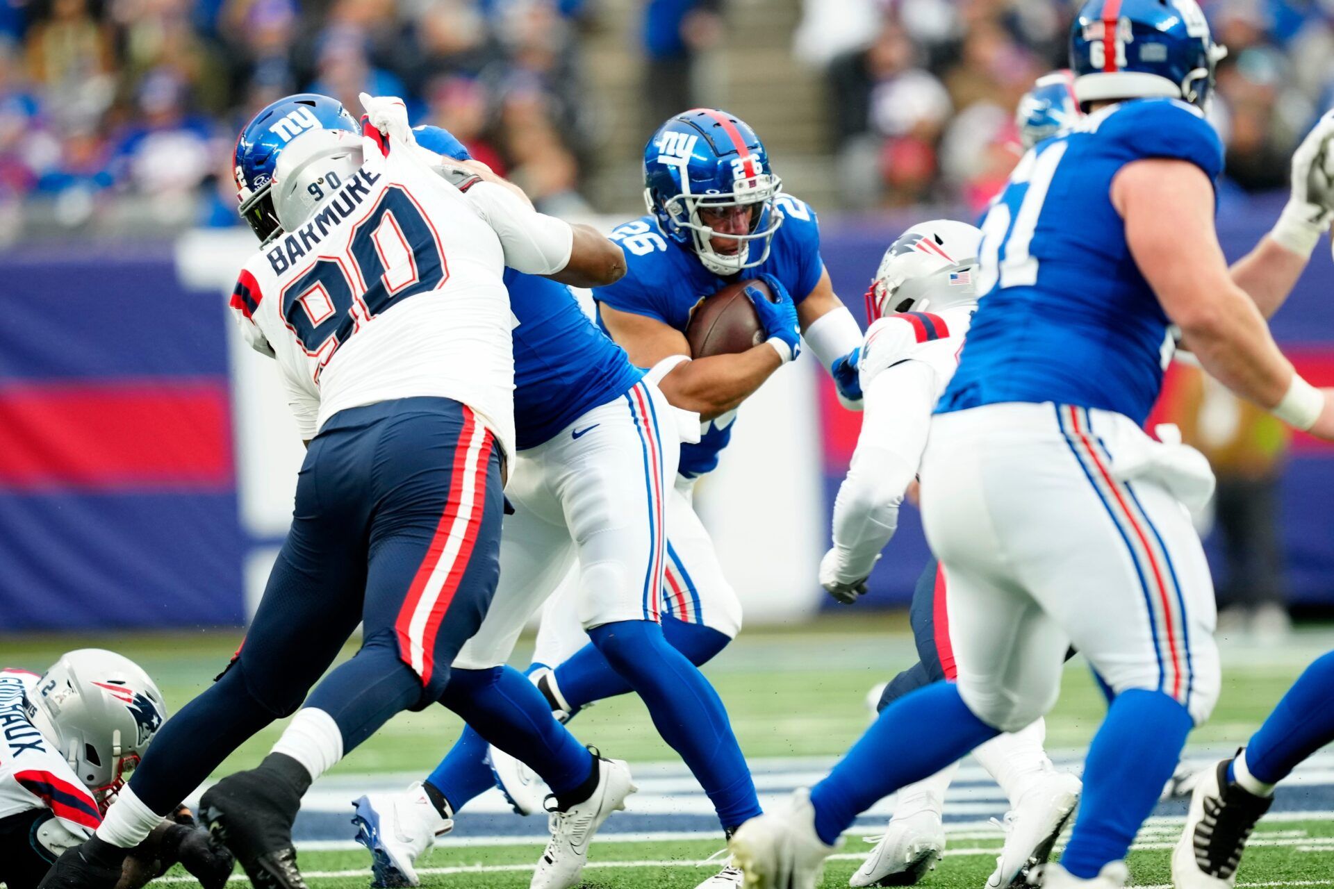 New York Giants running back Saquon Barkley (26) runs with the ball at MetLife Stadium.