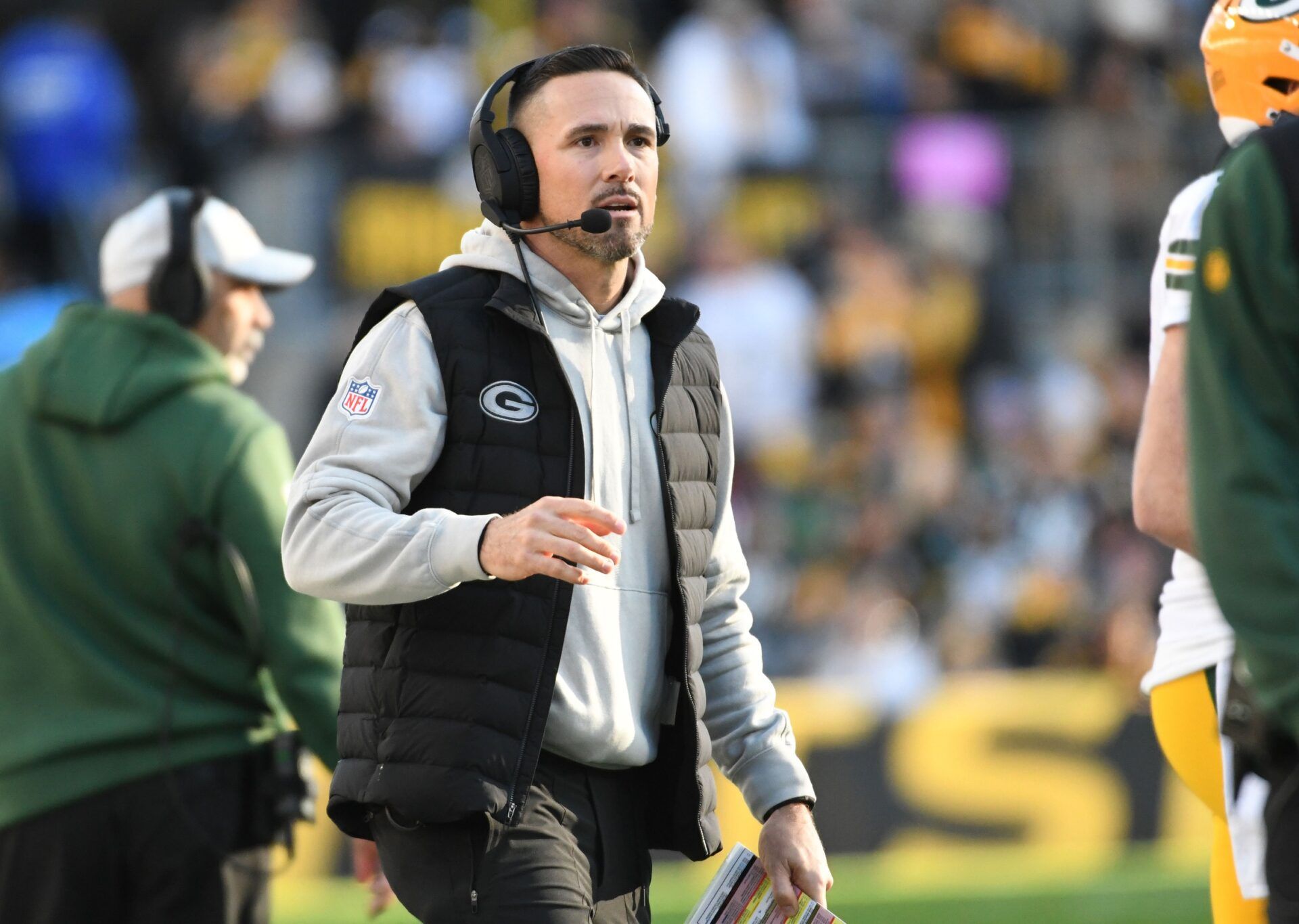 Green Bay Packers head coach Matt LaFleur walks the sidelines against the Pittsburgh Steelers during the third quarter at Acrisure Stadium.