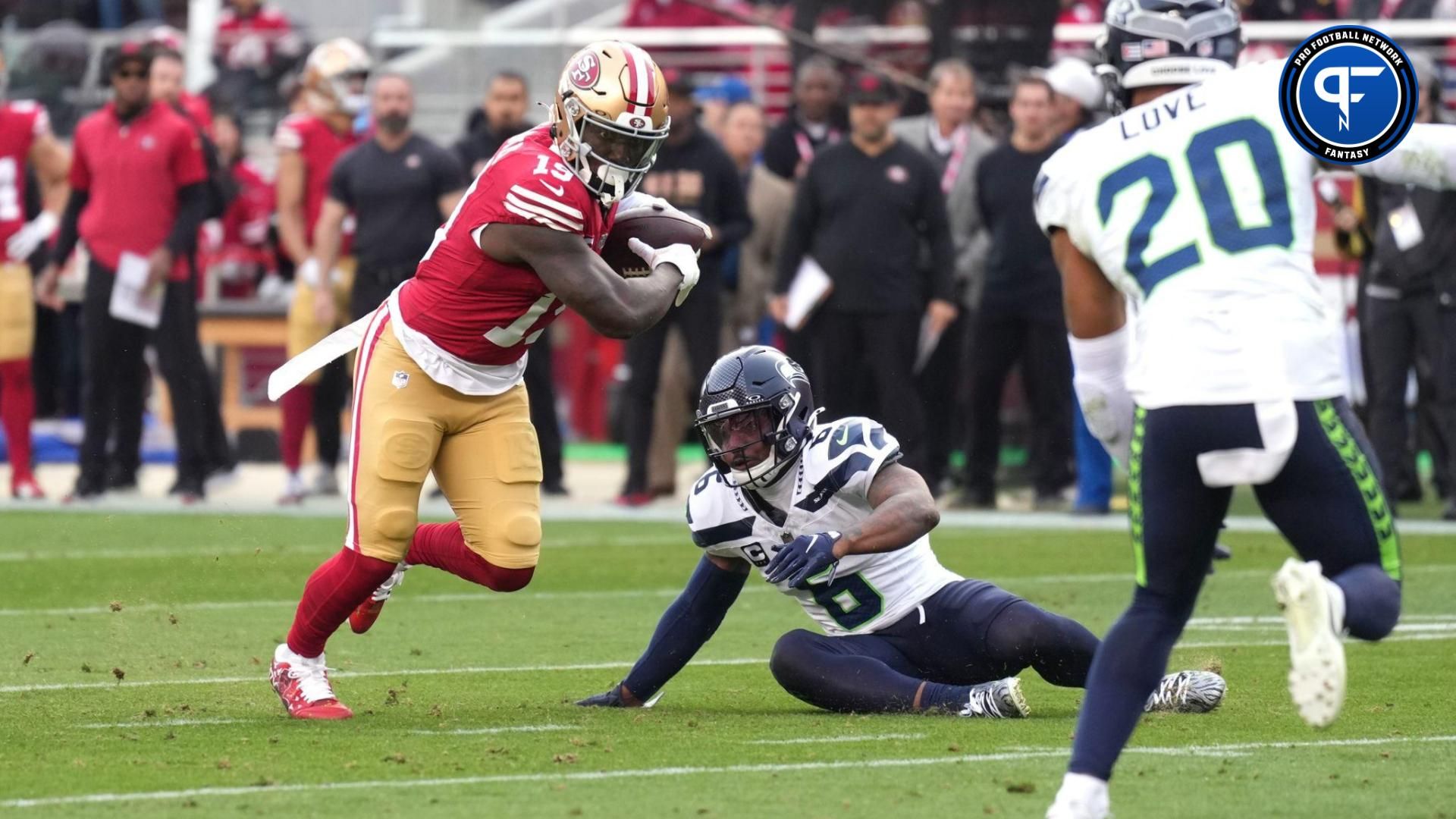 San Francisco 49ers WR Deebo Samuel (19) runs after the catch against the Seattle Seahawks.