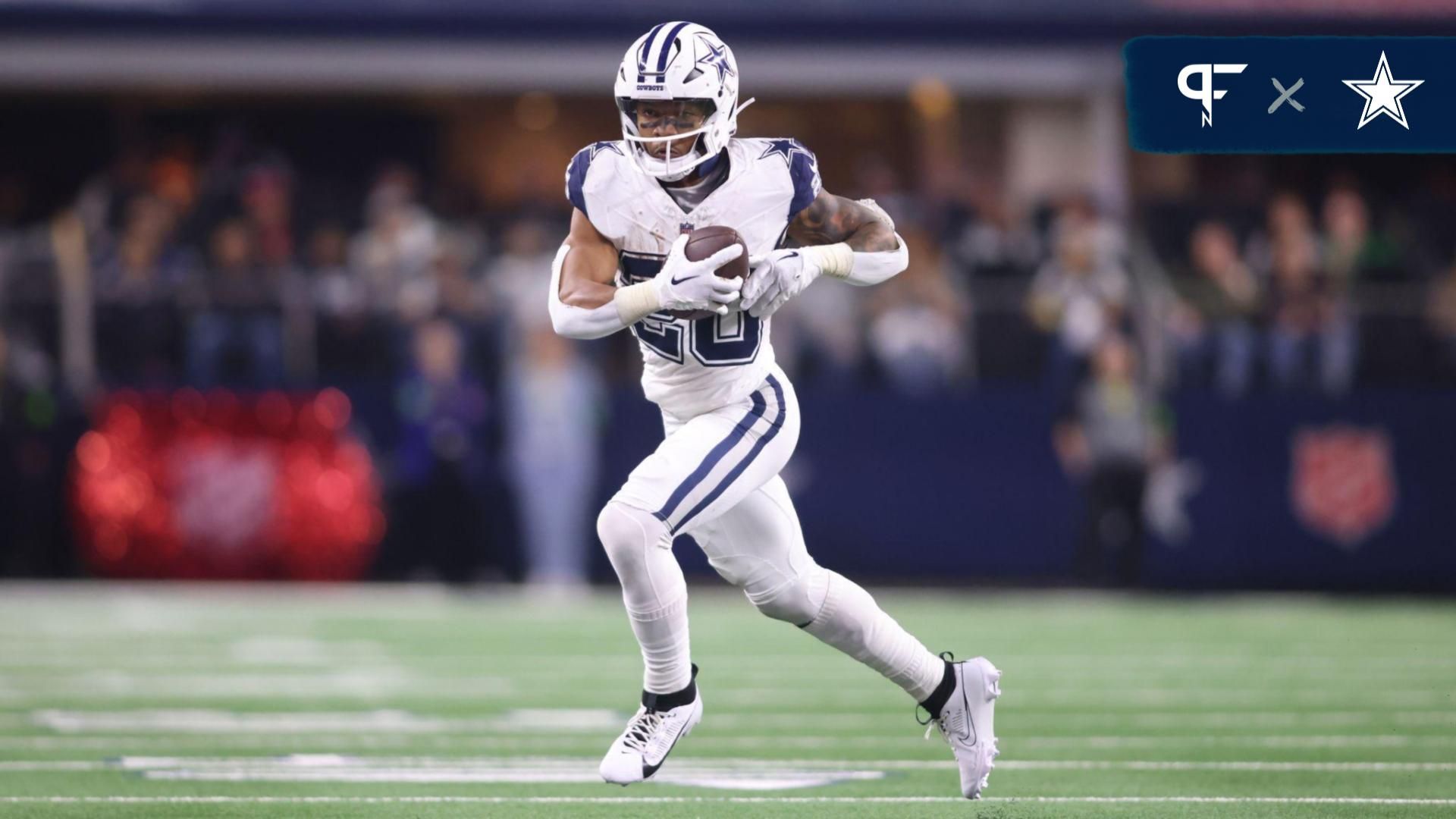 Dallas Cowboys running back Tony Pollard (20) runs the ball against the Philadelphia Eagles in the game at AT&T Stadium.