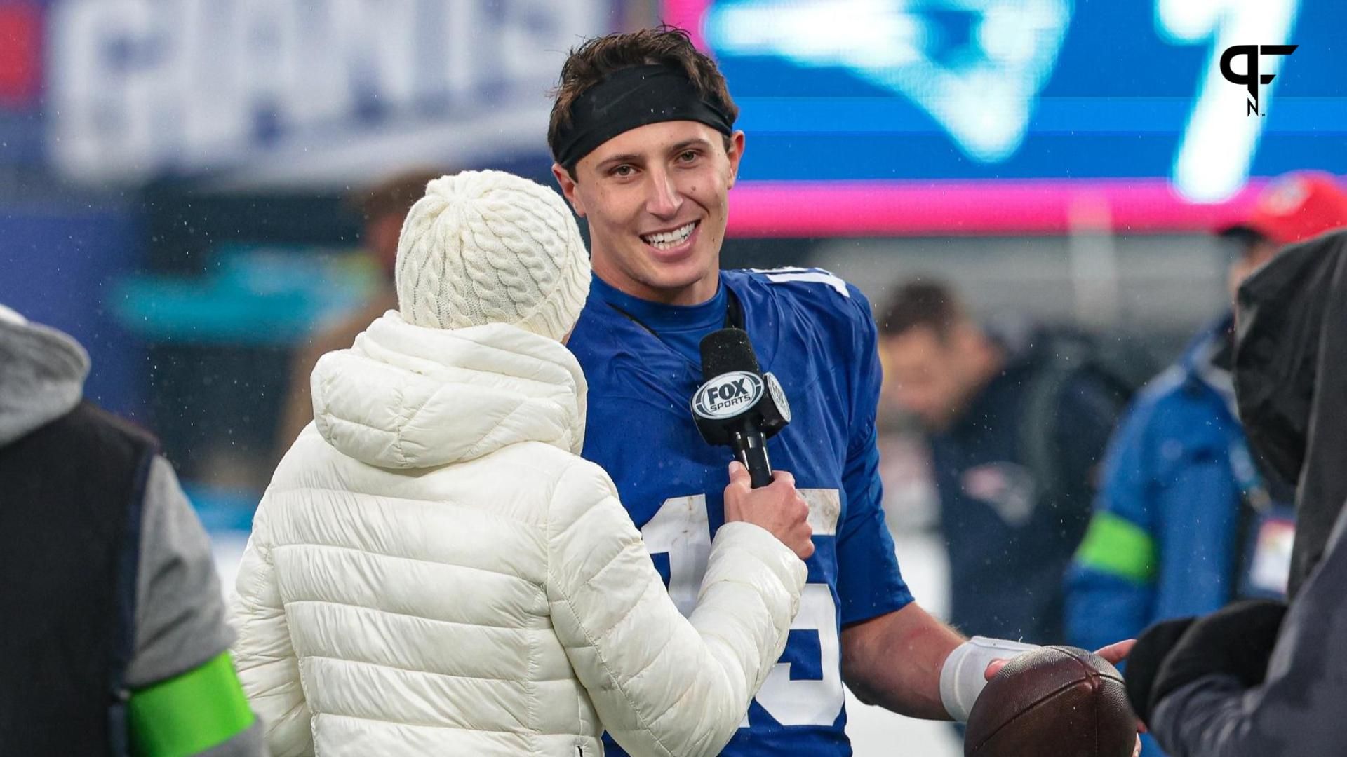 New York Giants quarterback Tommy DeVito (15) talks with Fox Sports media after the game against the New England Patriots at MetLife Stadium.