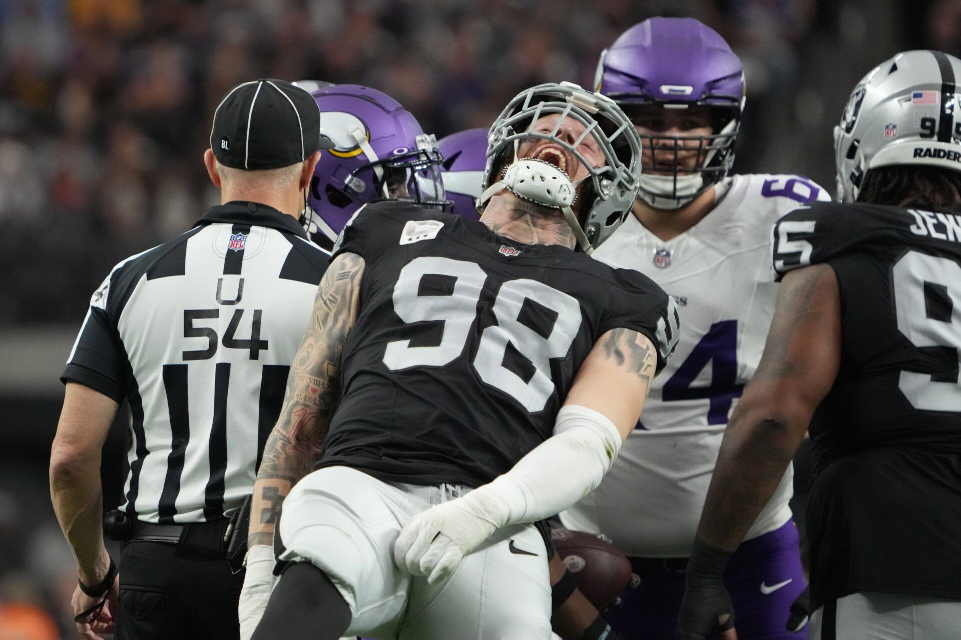 Las Vegas Raiders defensive end Maxx Crosby (98) celebrates after a tackle against the Minnesota Vikings in the first half at Allegiant Stadium.