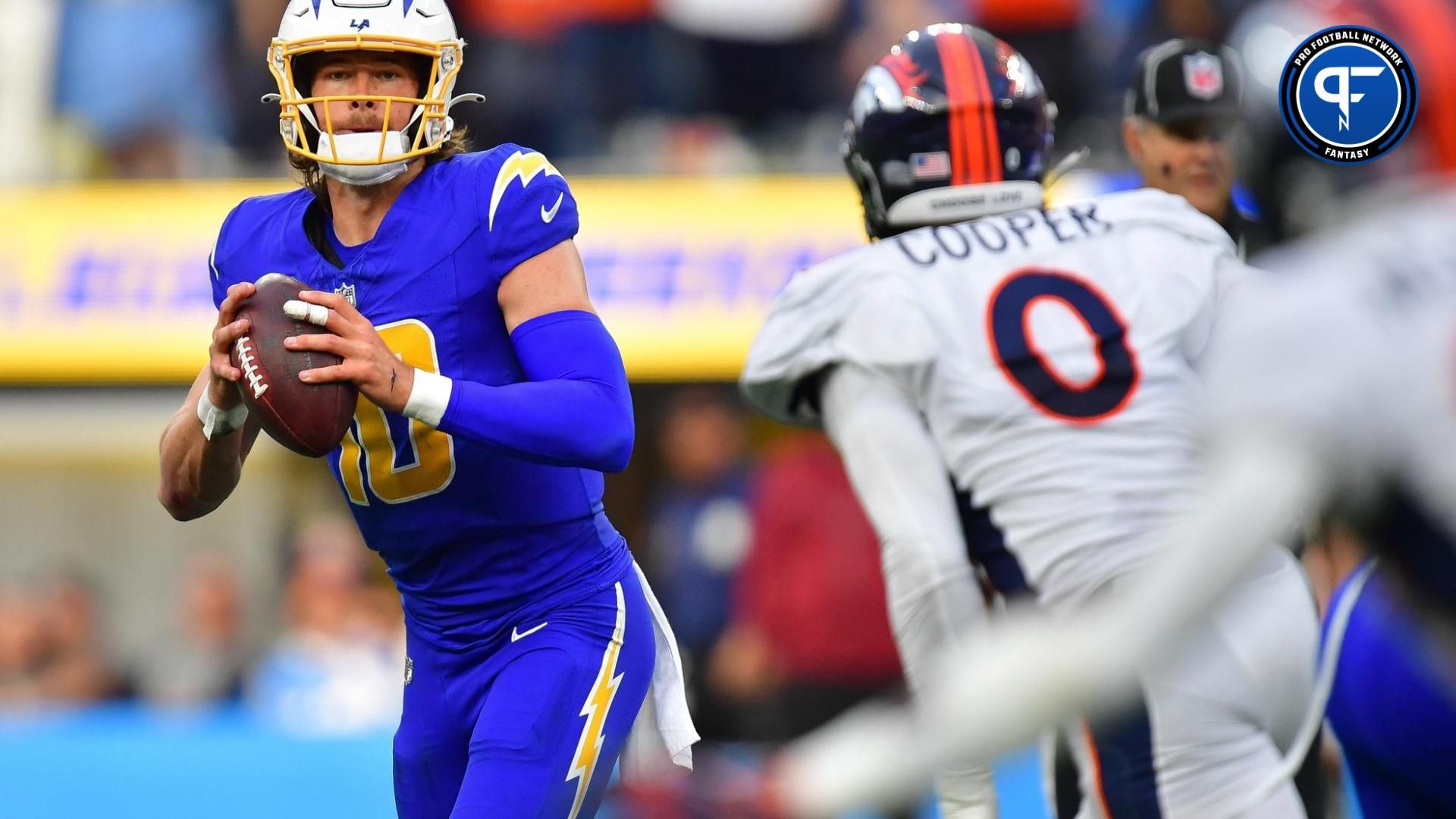 Los Angeles Chargers QB Justin Herbert (10) looks to throw against the Denver Broncos.