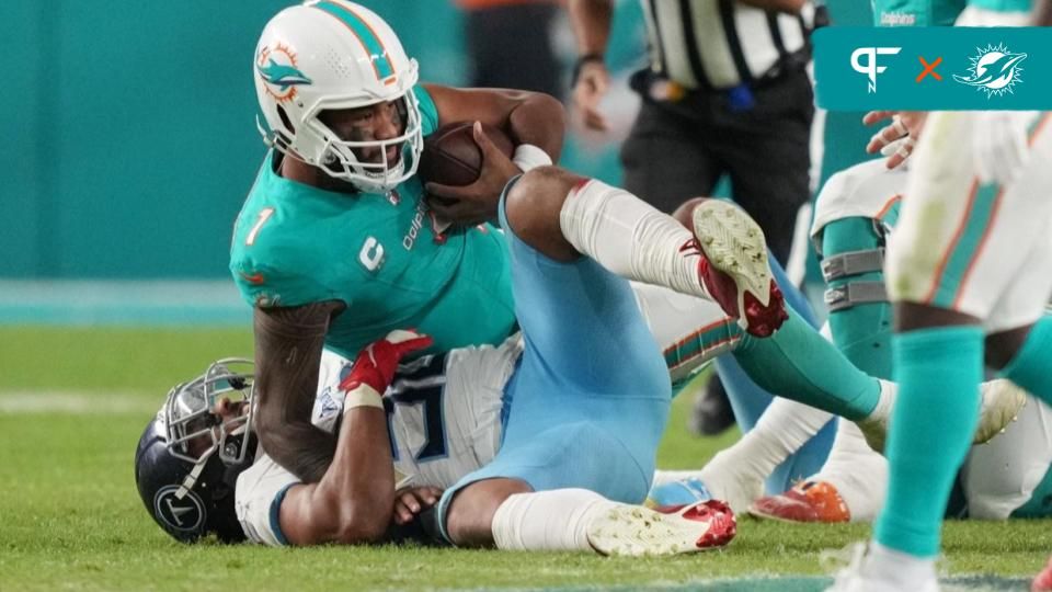 Tennessee Titans linebacker Harold Landry III (58) sacks Miami Dolphins quarterback Tua Tagovailoa (1) late in the game on fourth down to seal the game for the Titans at Hard Rock Stadium in Miami Gar...