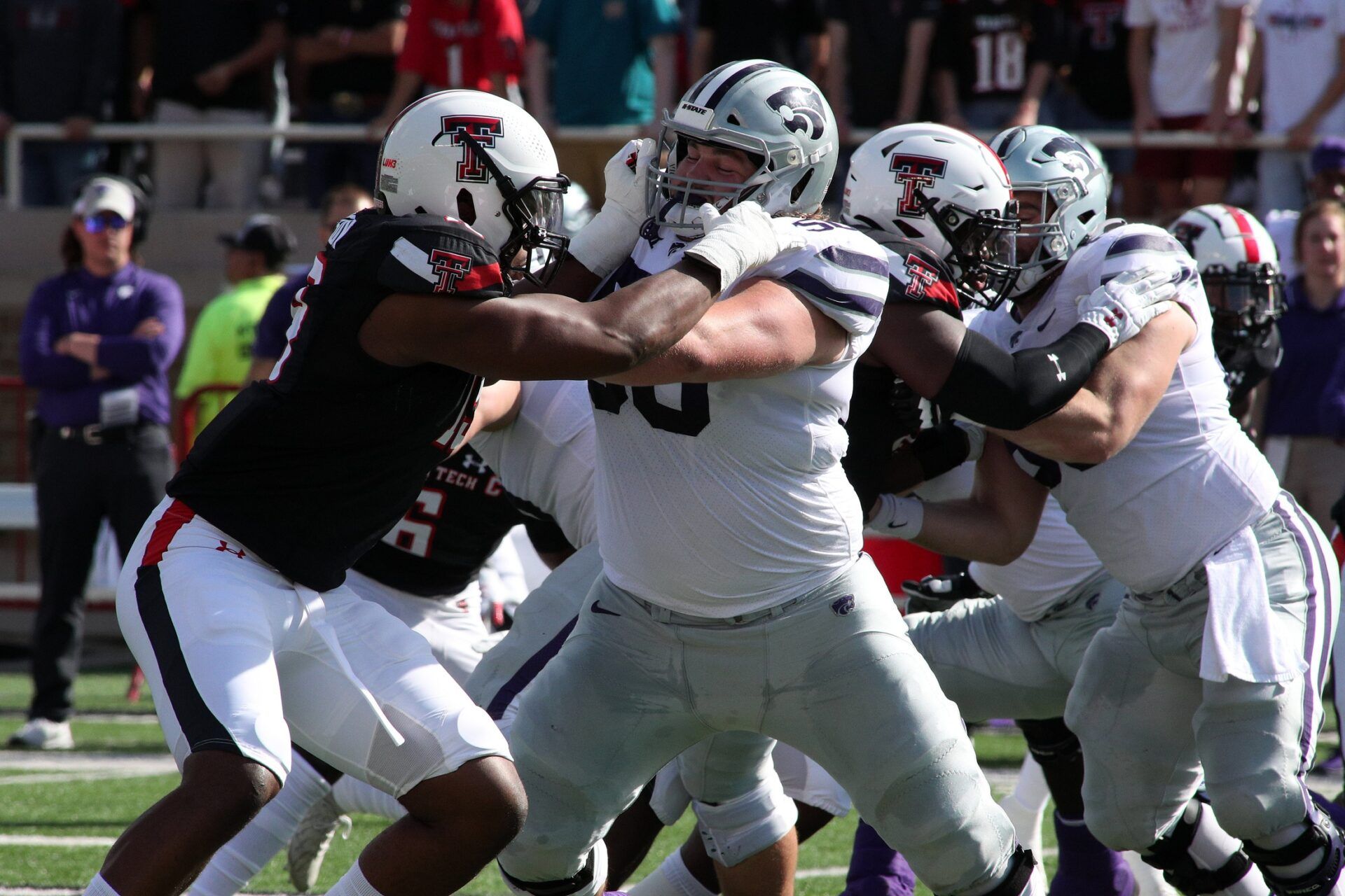 Kansas State Wildcats offensive lineman Cooper Beebe (50) blocks Texas Tech Red Raiders defensive lineman Tyree Wilson (19) in the first half at Jones AT&T Stadium.