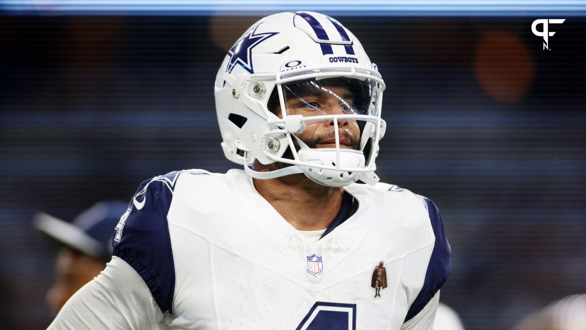 Dallas Cowboys quarterback Dak Prescott (4) runs off the field before the game against the Philadelphia Eagles at AT&T Stadium.