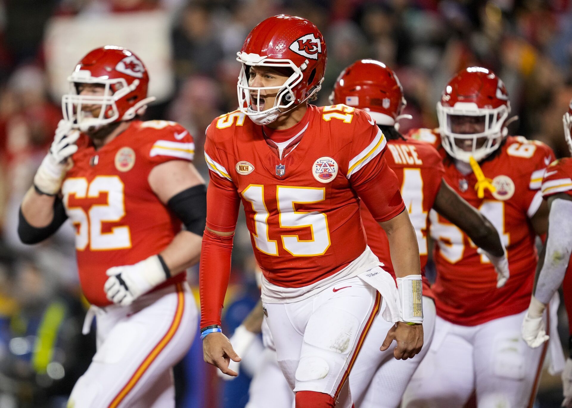 Kansas City Chiefs quarterback Patrick Mahomes (15) celebrates after a touchdown during the second half against the Buffalo Bills at GEHA Field at Arrowhead Stadium.