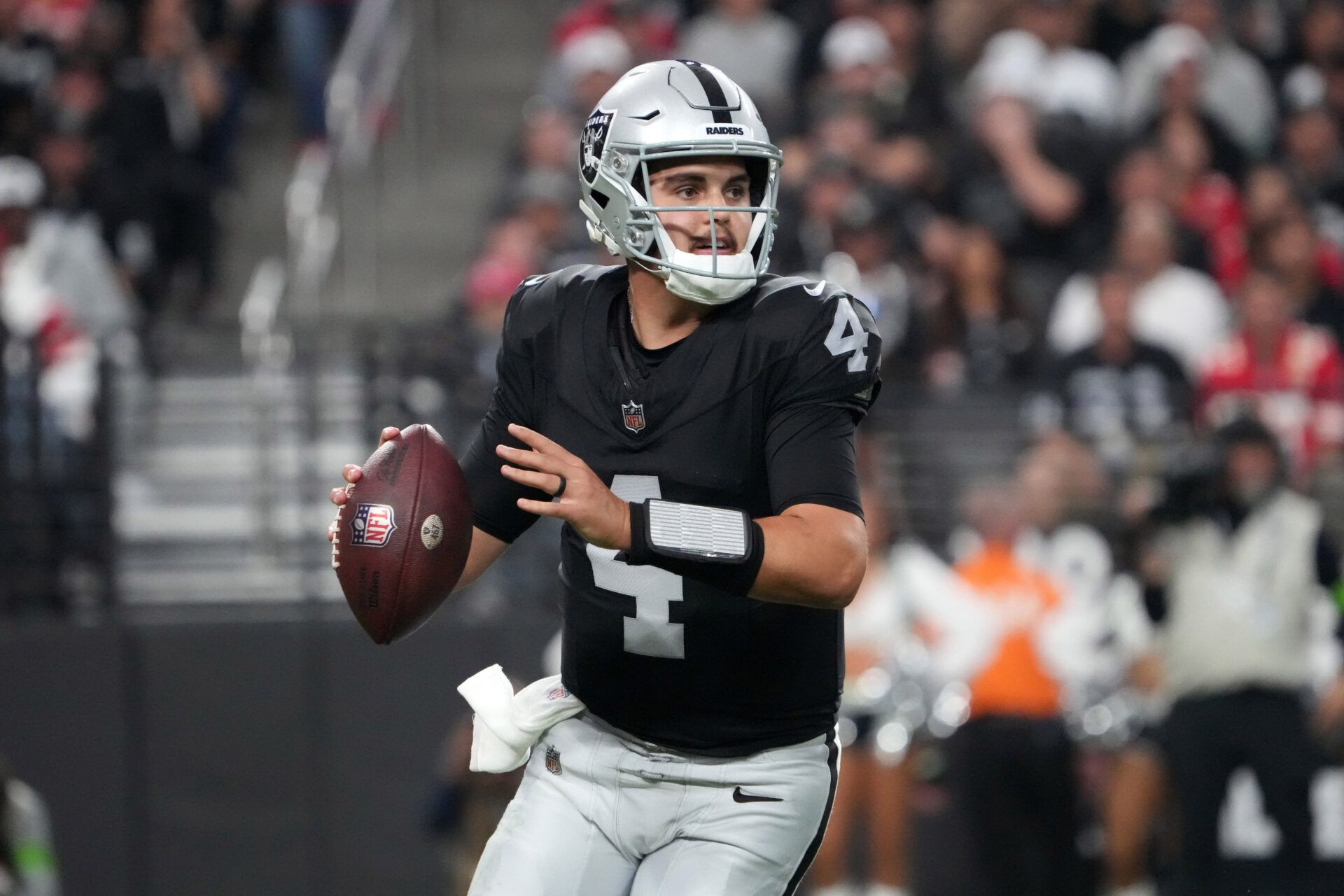 Las Vegas Raiders quarterback Aidan O'Connell (4) throws the ball against the Kansas City Chiefs in the second half at Allegiant Stadium.