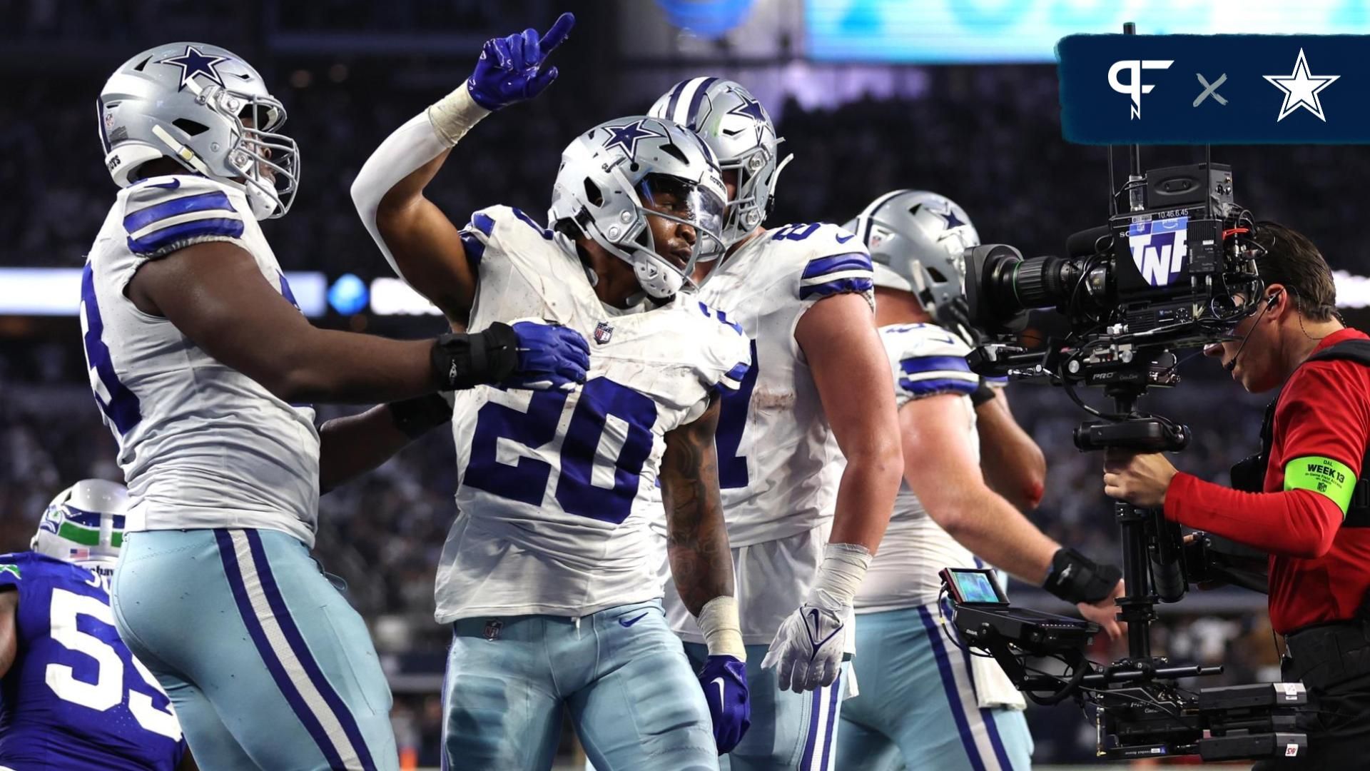 Dallas Cowboys running back Tony Pollard (20) celebrates after scoring a touchdown against the Seattle Seahawks during the second half at AT&T Stadium.