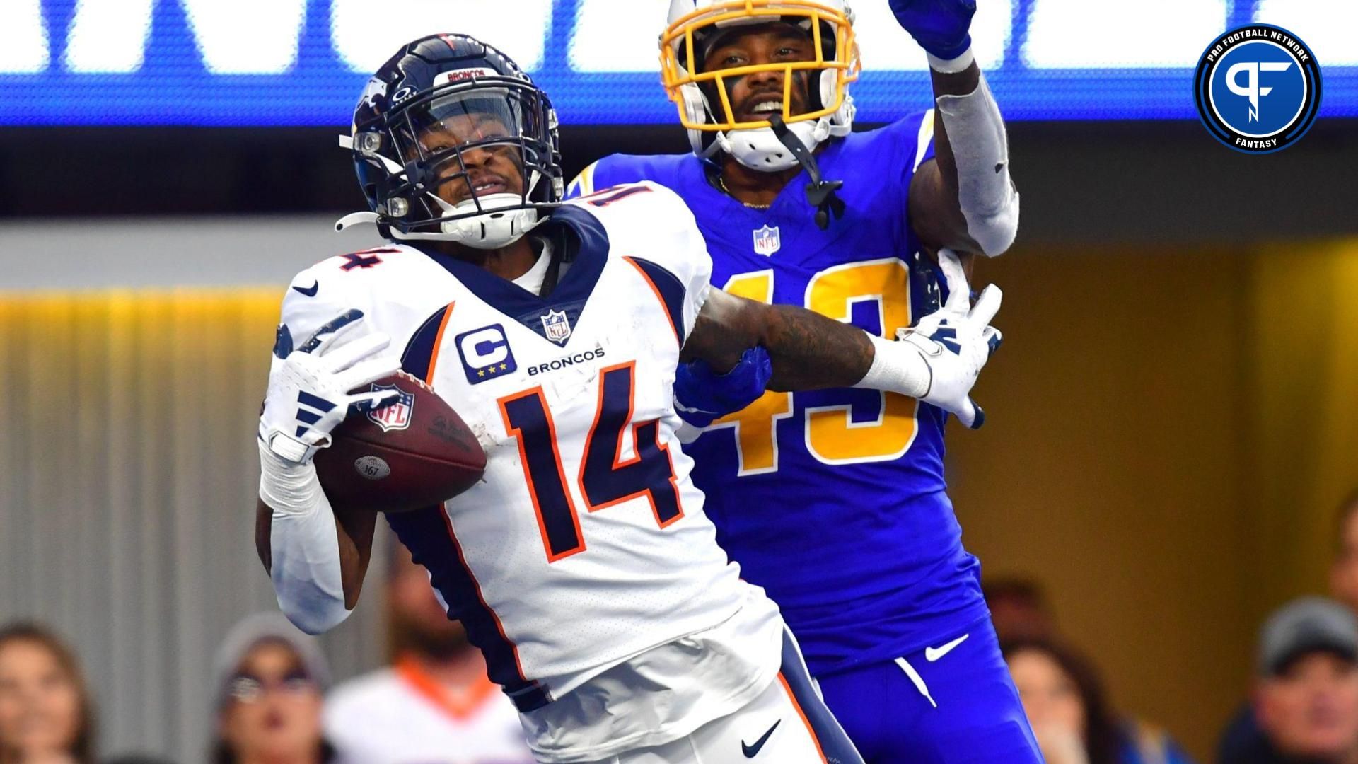 Denver Broncos wide receiver Courtland Sutton (14) catches a touchdown pass against Los Angeles Chargers cornerback Michael Davis (43) during the second half at SoFi Stadium.