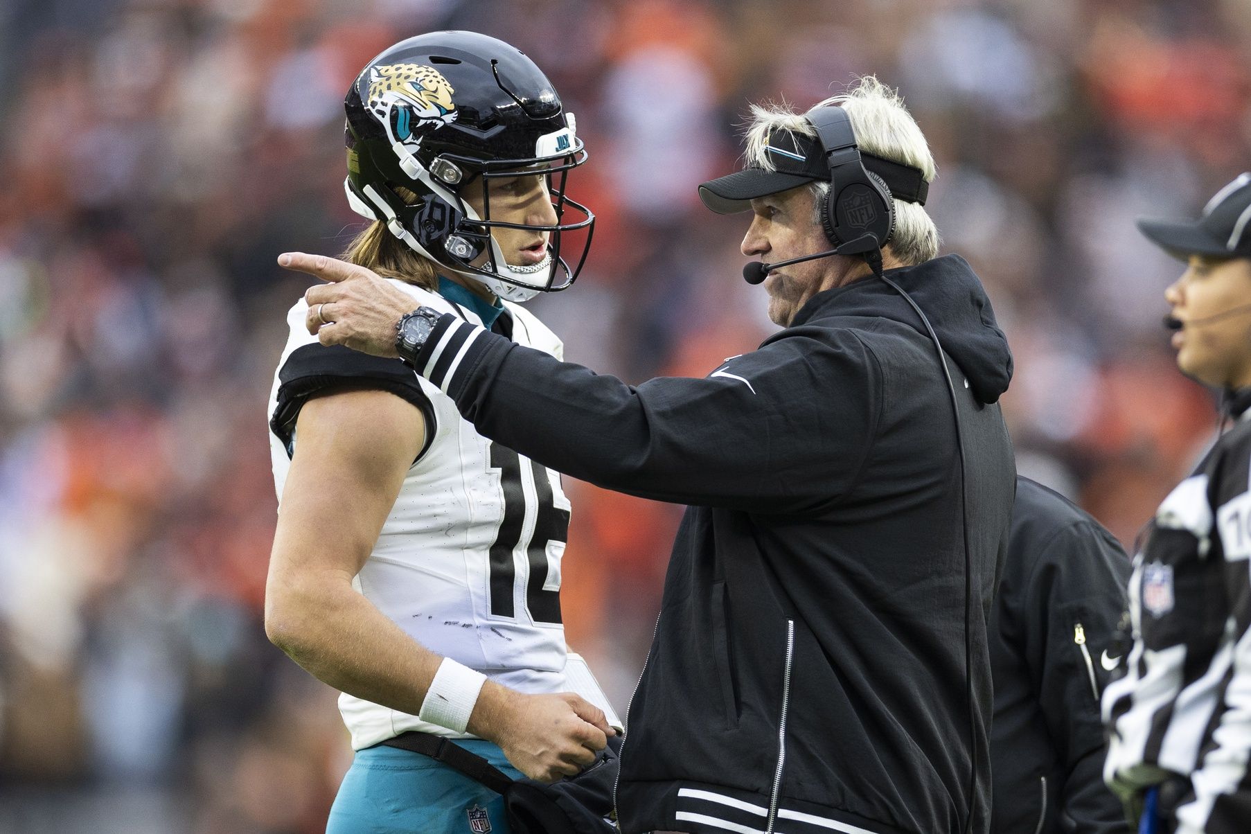 Jacksonville Jaguars head coach Doug Pederson talks with quarterback Trevor Lawrence (16) during the third quarter against the Cleveland Browns at Cleveland Browns Stadium.