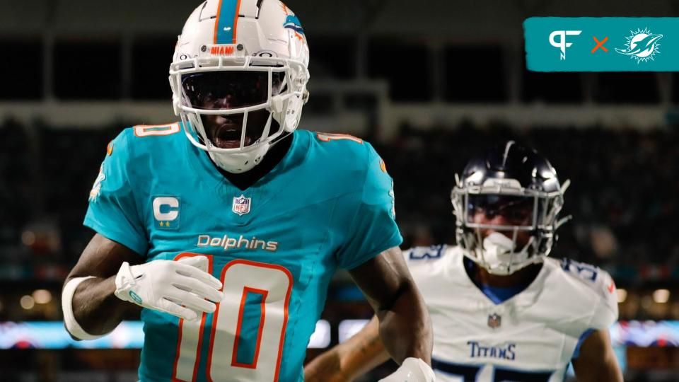 Miami Dolphins wide receiver Tyreek Hill (10) runs out of bound against the Tennessee Titans during the fourth quarter at Hard Rock Stadium.