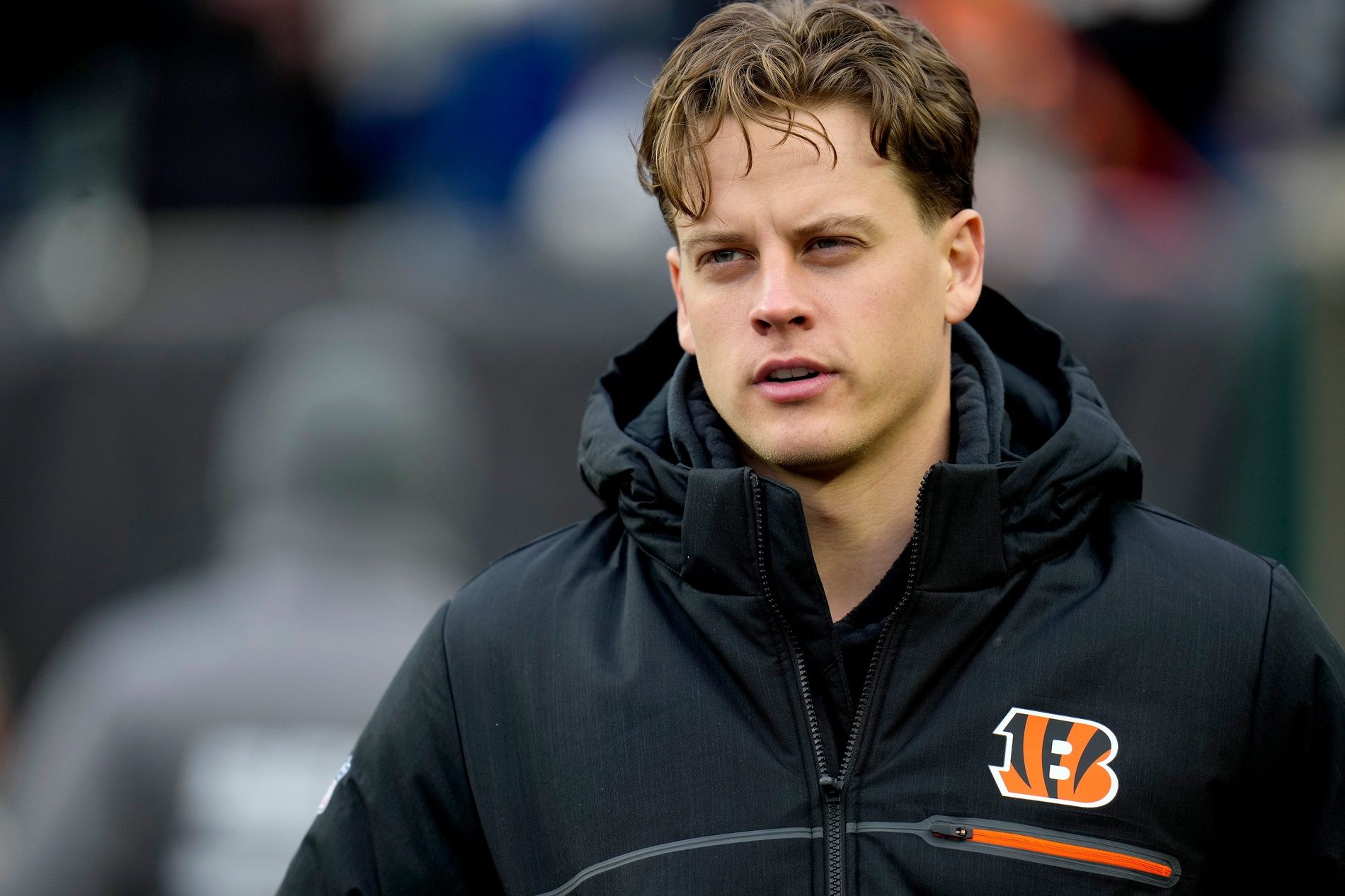 Joe Burrow (9) takes the field before his teammates face the Indianapolis Colts and the Cincinnati Bengals.