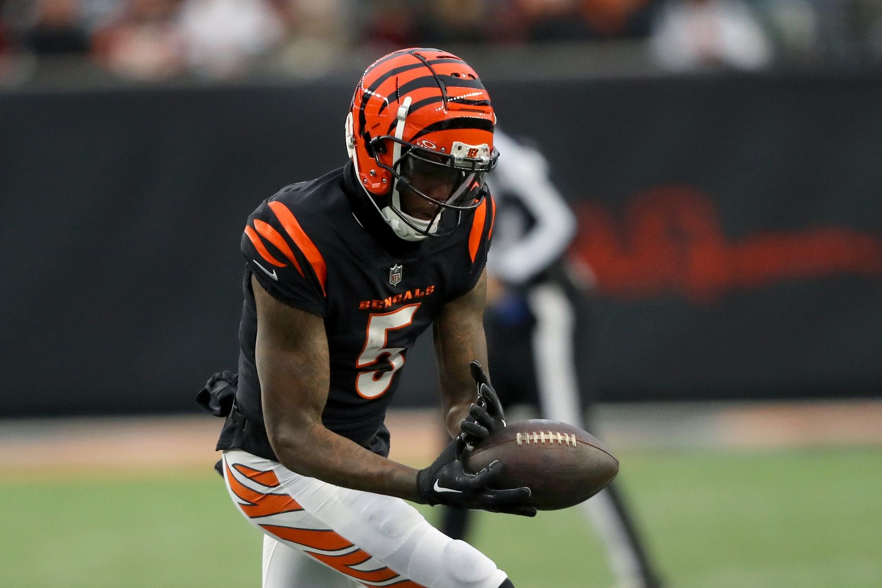 Cincinnati Bengals wide receiver Tee Higgins (5) drops the pass as Indianapolis Colts safety Julian Blackmon (32) plays in coverage during the second half at Paycor Stadium.