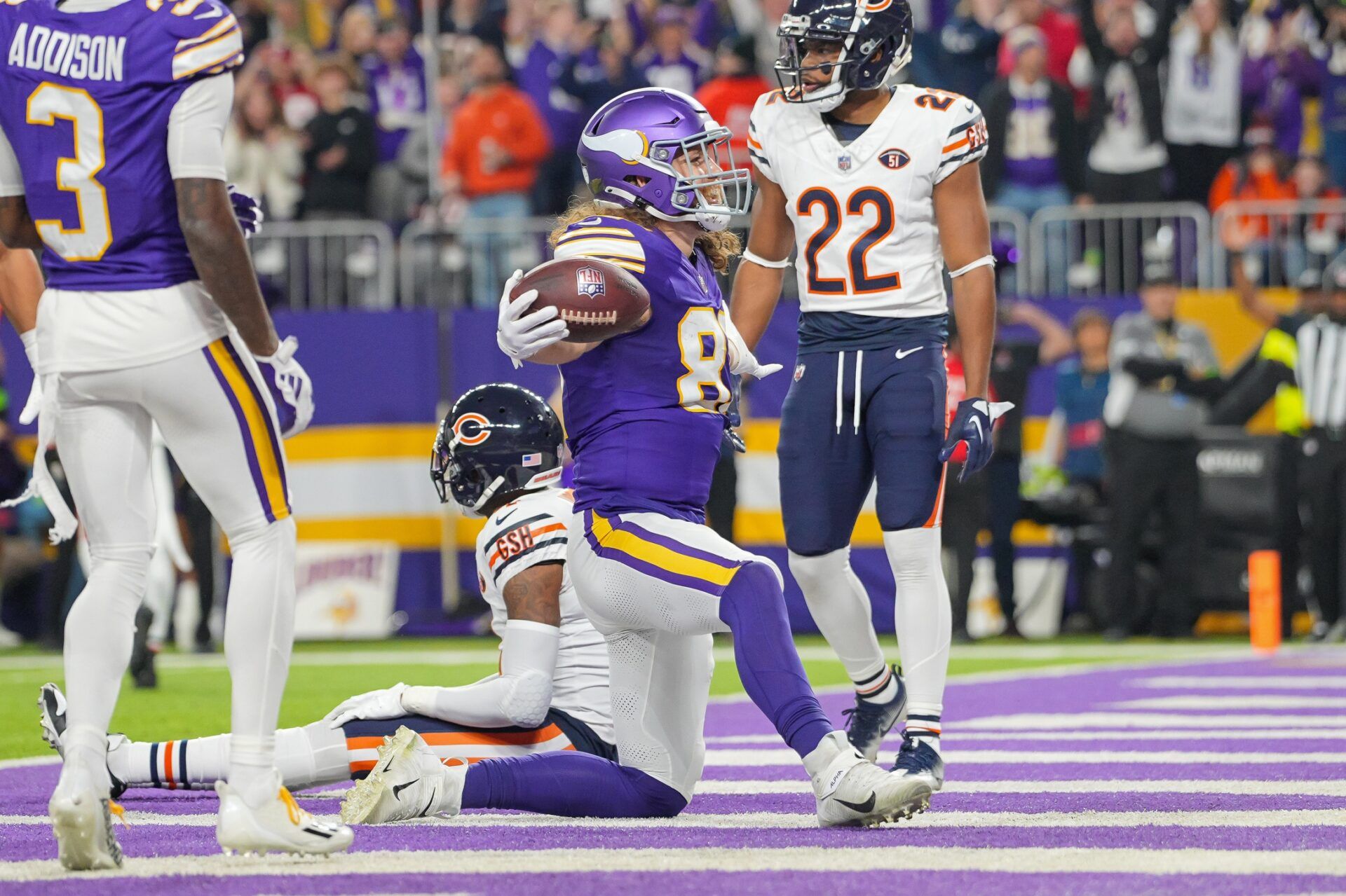 Minnesota Vikings tight end T.J. Hockenson (87) celebrates his touchdown against the Chicago Bears in the fourth quarter at U.S. Bank Stadium.