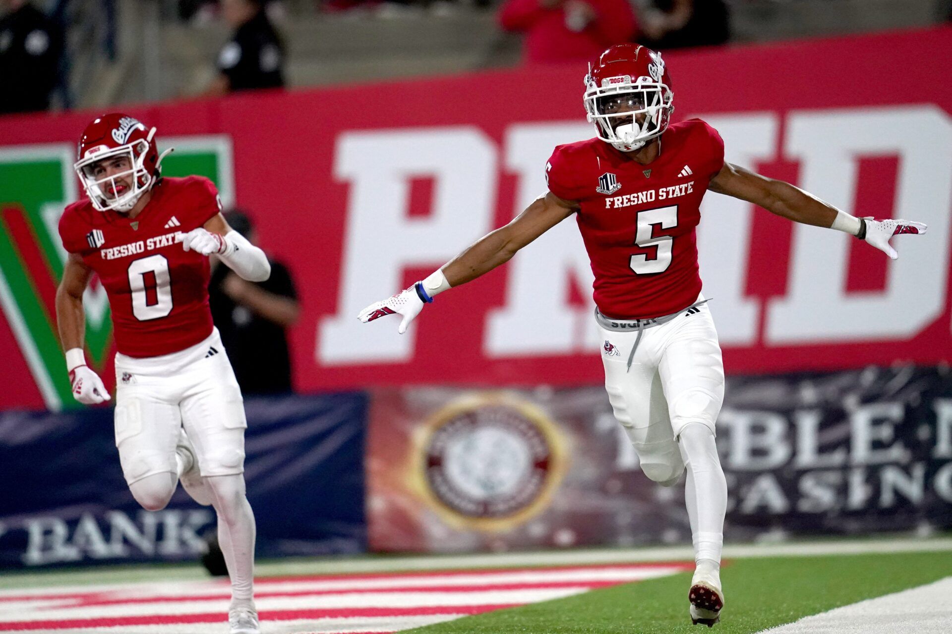 Fresno State Bulldogs WR Jaelen Gill (5) reacts after catching a pass for a touchdown against the Nevada Wolf Pack.