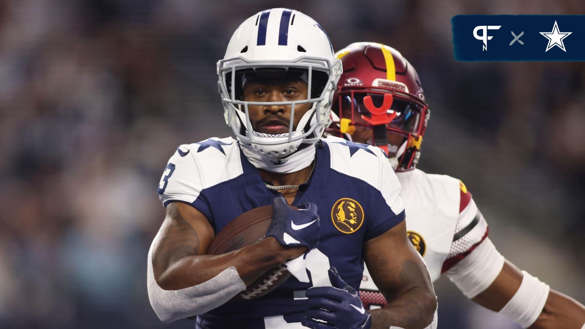 Dallas Cowboys wide receiver Brandin Cooks (3) scores a touchdown in the second quarter against the Washington Commanders at AT&T Stadium.