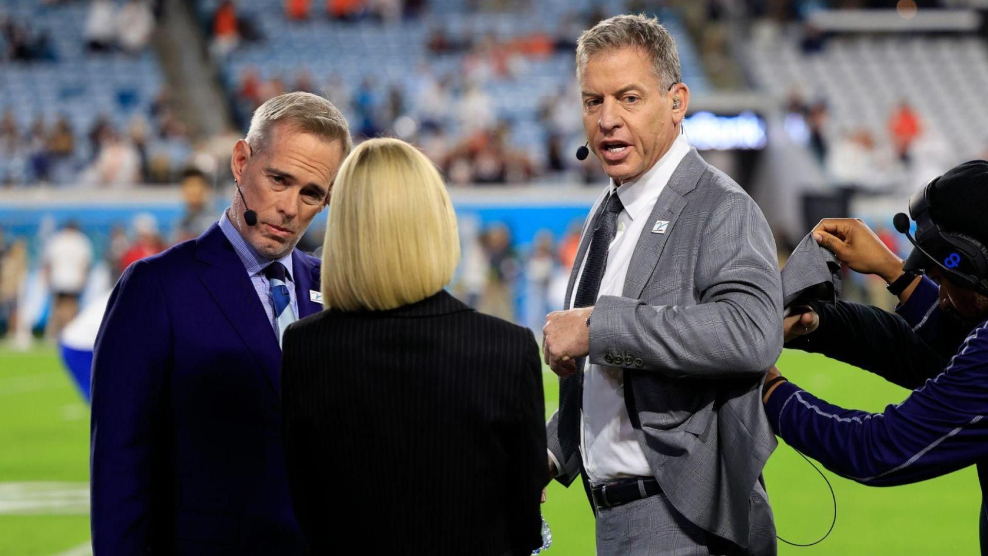 Commentators Joe Buck, left, and Troy Aikman are mic-ed up before a regular season NFL football matchup Monday, Dec. 4, 2023 at EverBank Stadium in Jacksonville, Fla.