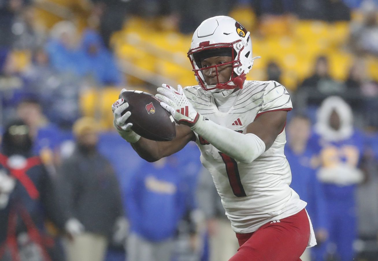 Louisville Cardinals wide receiver Jamari Thrash (1) makes a catch against the Pittsburgh Panthers during the third quarter at Acrisure Stadium.