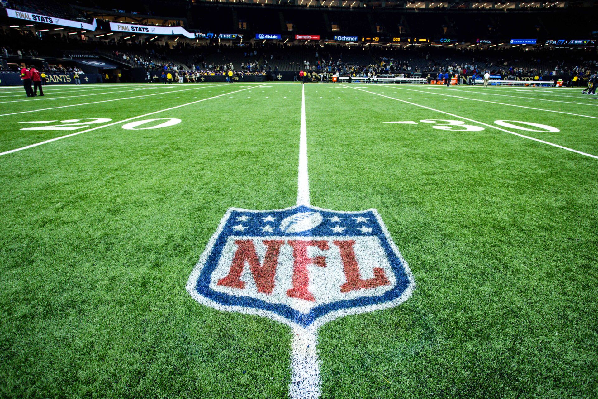 Detailed view of the NFL shield on the field after the game between the New Orleans Saints and the Carolina Panthers at the Caesars Superdome.