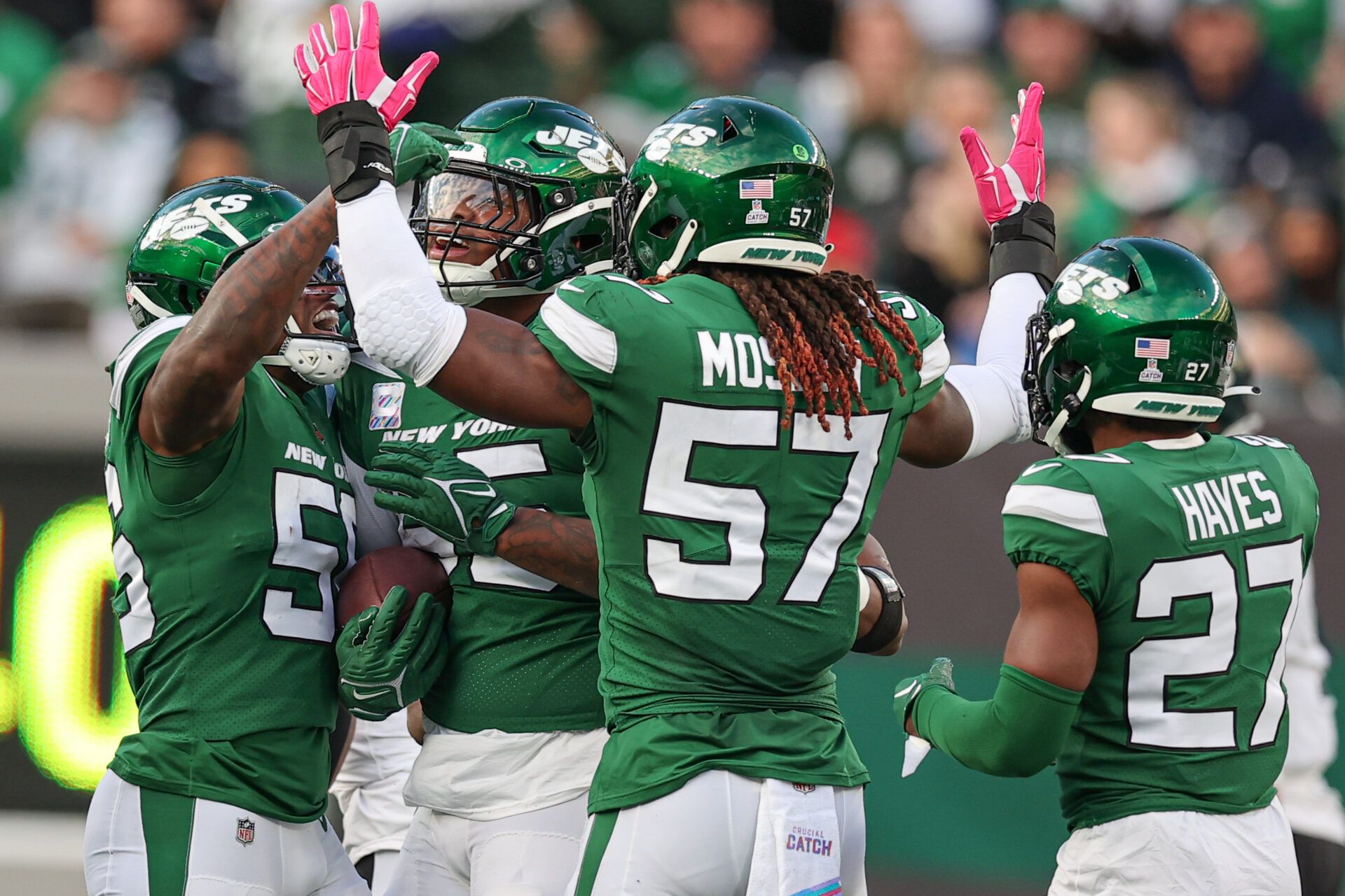 New York Jets defensive tackle Quinnen Williams (95) celebrates with teammates after recovering a fumble during the first half against the Philadelphia Eagles at MetLife Stadium.