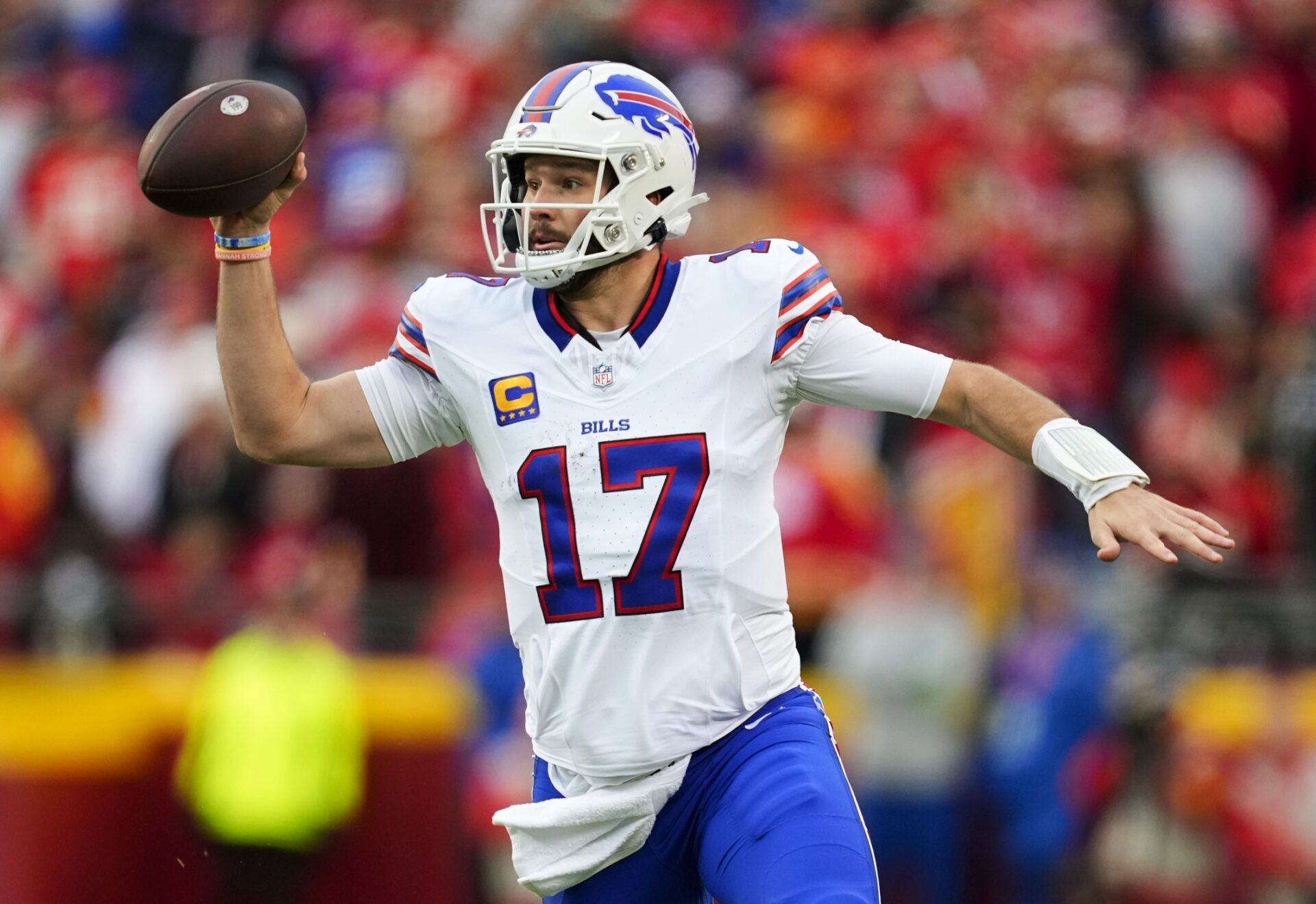 Buffalo Bills quarterback Josh Allen (17) scrambles during the first half against the Kansas City Chiefs at GEHA Field at Arrowhead Stadium.