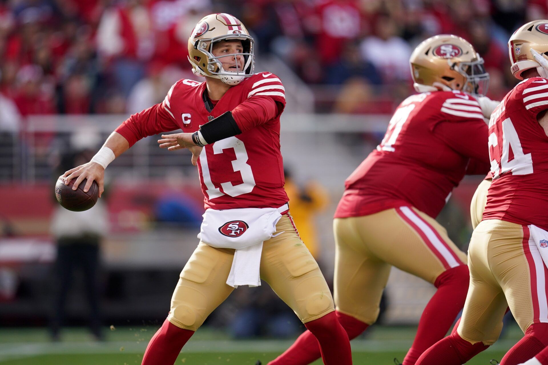 San Francisco 49ers quarterback Brock Purdy (13) throws a pass against the Seattle Seahawks in the first quarter at Levi's Stadium.