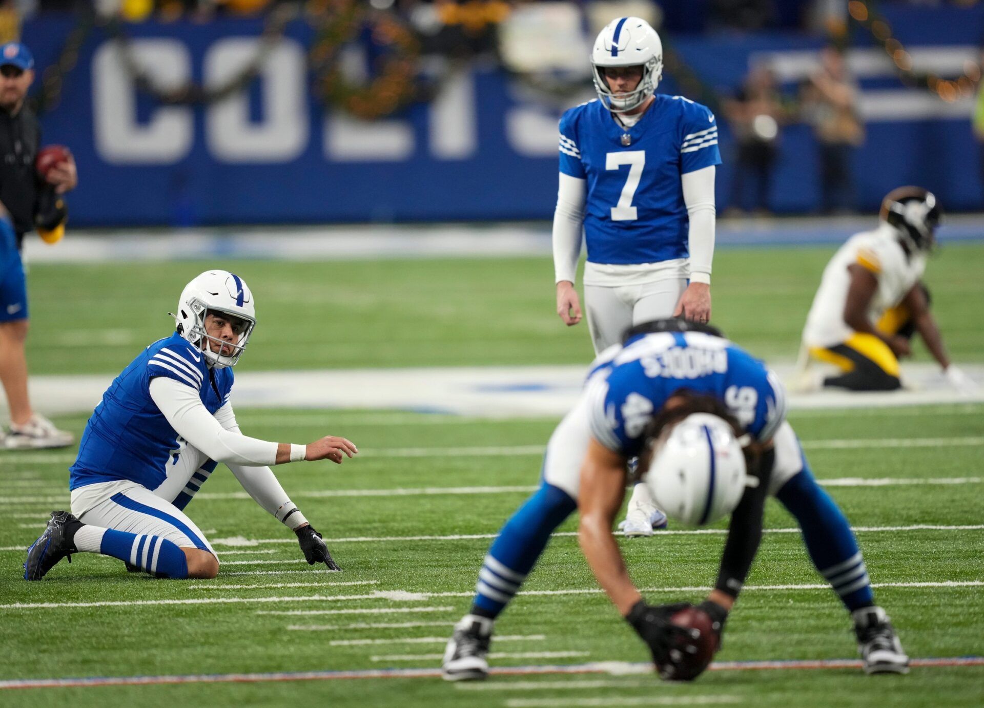 The Colts kicking crew warms up about two hours before their game against Pittsburgh.