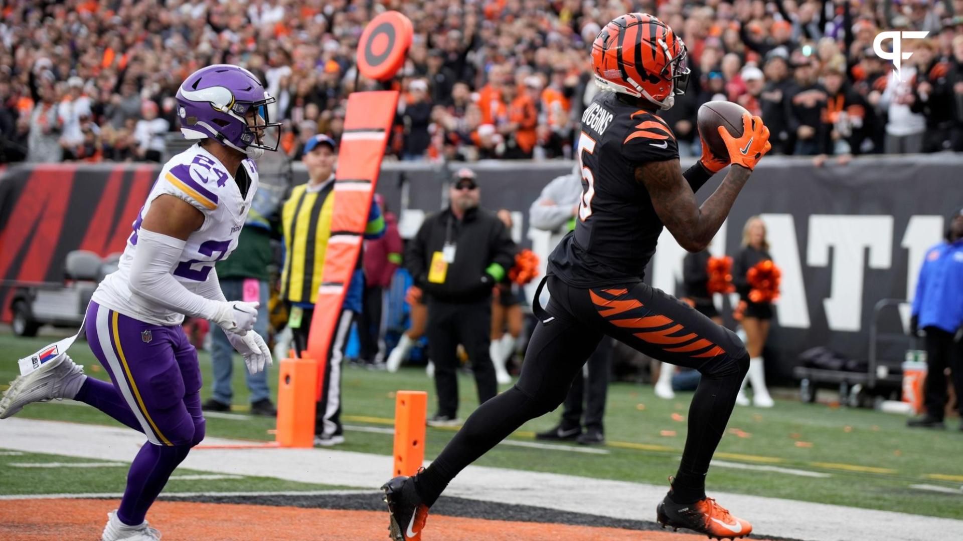 Tee Higgins (5) makes a 13-yard touchdown in the 4th quarter over Minnesota Vikings at Paycor Stadium.