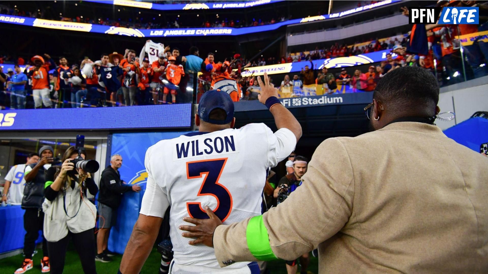 Denver Broncos quarterback Russell Wilson (3) celebrates the victory against the Los Angeles Chargers at SoFi Stadium.