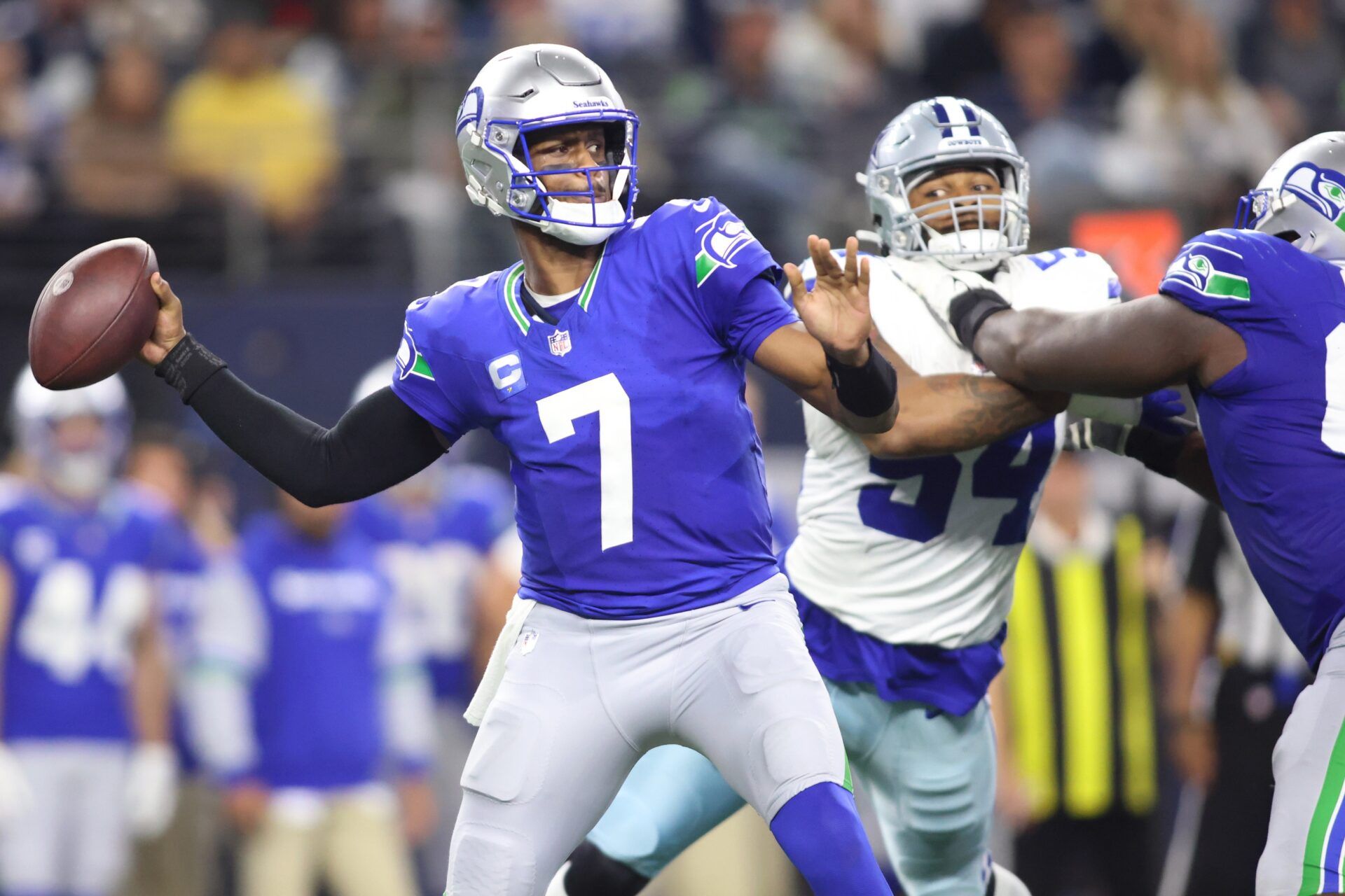 Seattle Seahawks QB Geno Smith (7) throws a pass against the Dallas Cowboys.