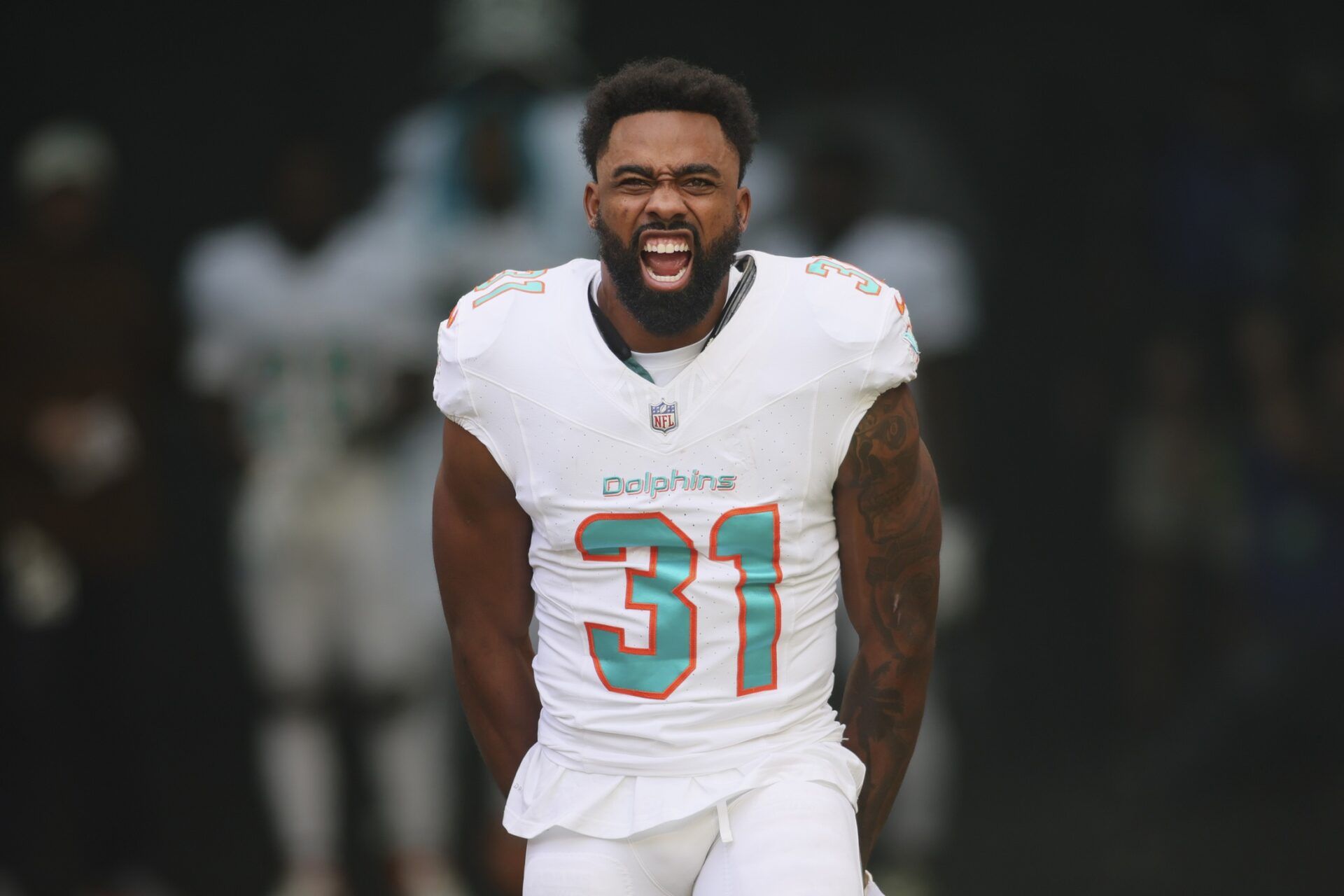 Miami Dolphins running back Raheem Mostert (31) reacts as he takes the field prior to the game against the Las Vegas Raiders at Hard Rock Stadium.