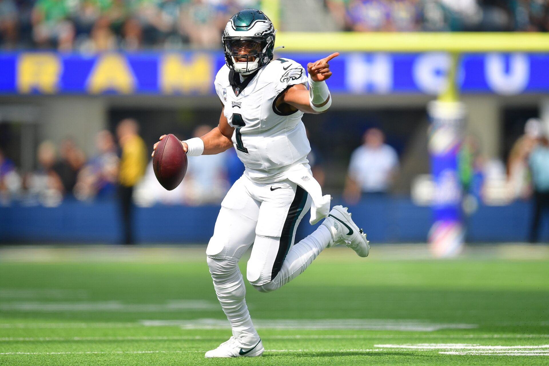 Philadelphia Eagles QB Jalen Hurts (1) rolls out on a play against the Los Angeles Rams.