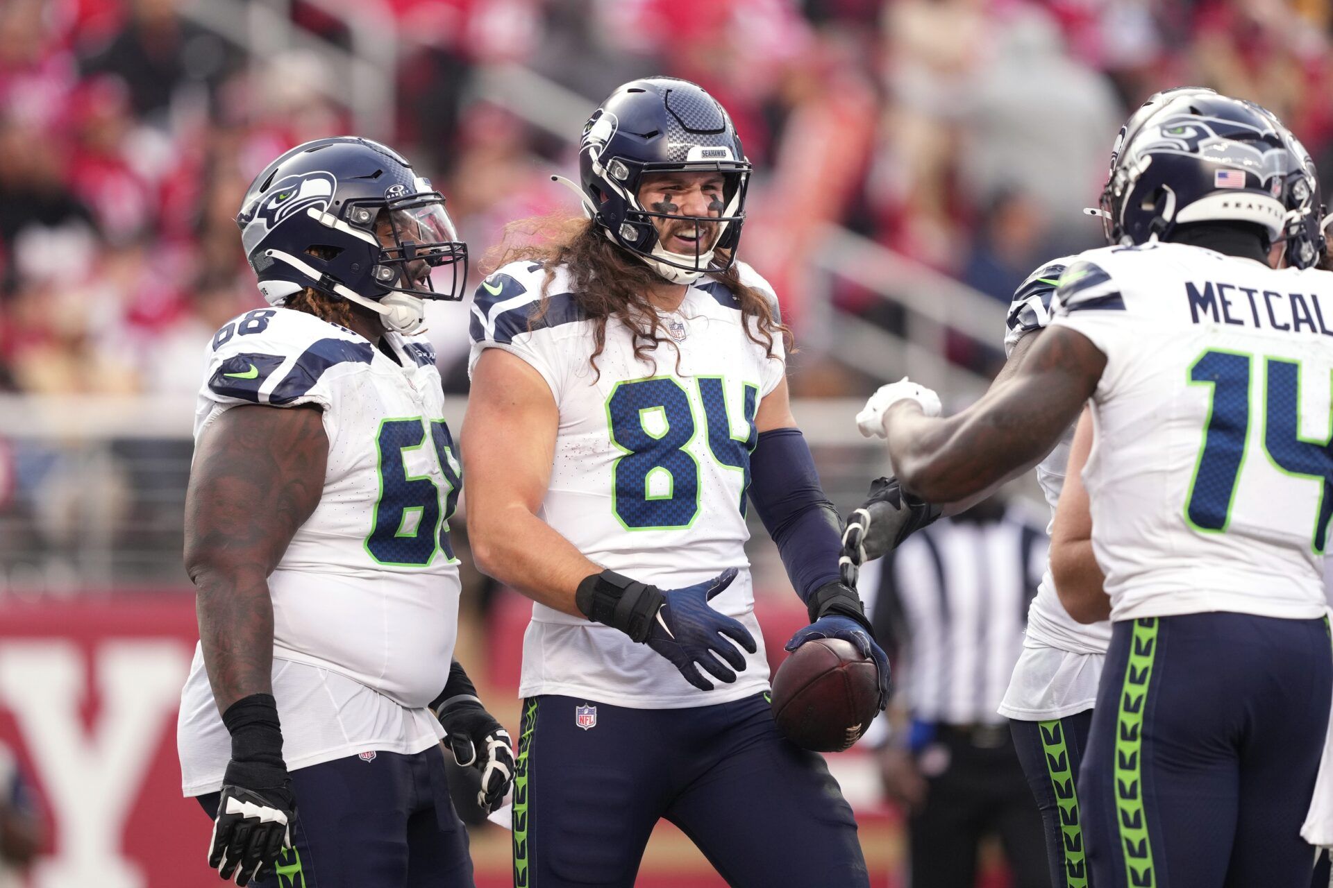 Seattle Seahawks players celebrate after a touchdown against the San Francisco 49ers.