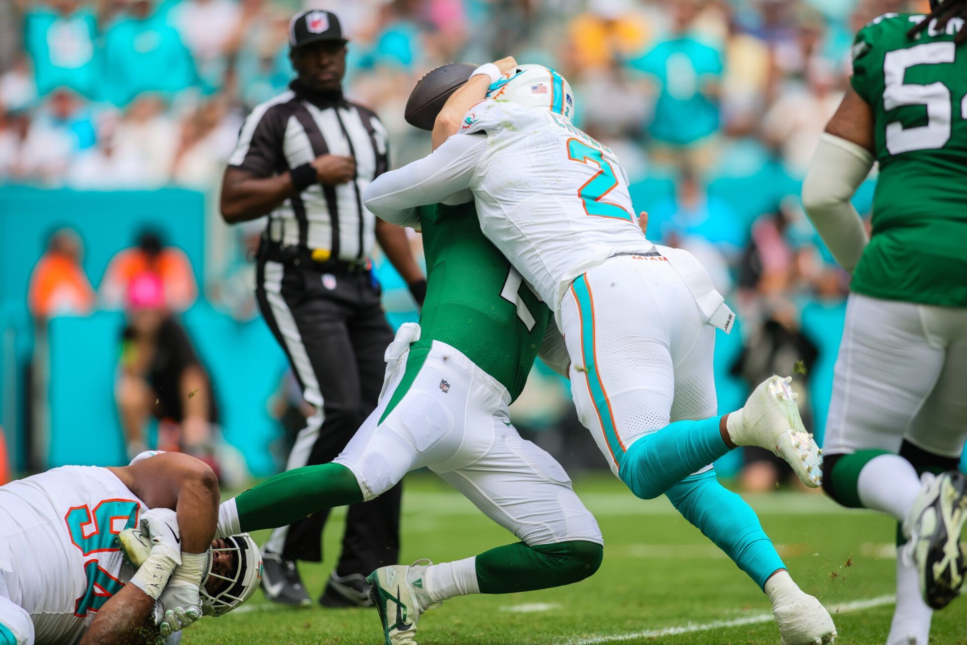 Miami Dolphins linebacker Bradley Chubb (2) sacks New York Jets quarterback Zach Wilson (2).