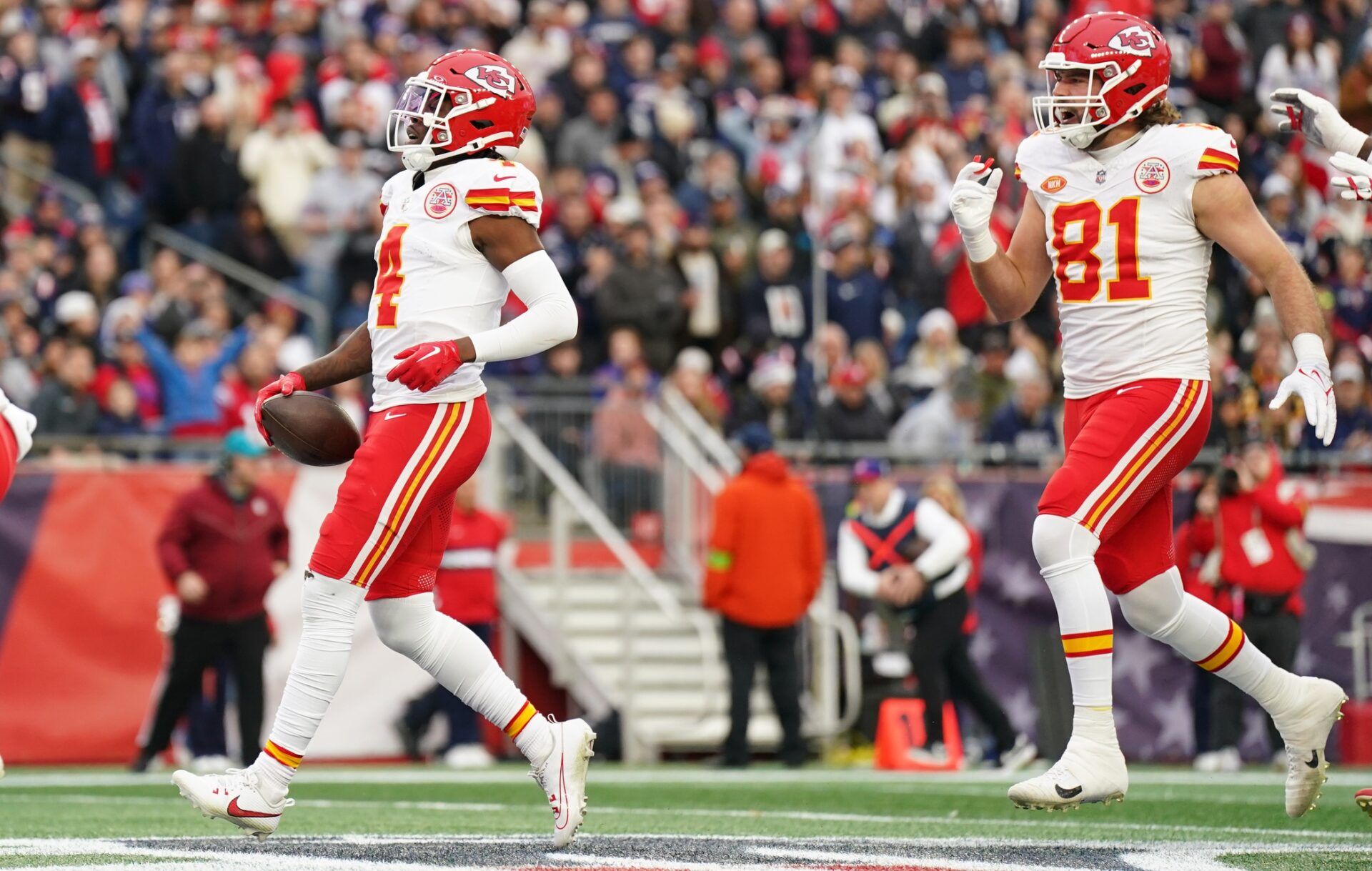 Kansas City Chiefs WR Rashee Rice (4) scores a touchdown against the New England Patriots.