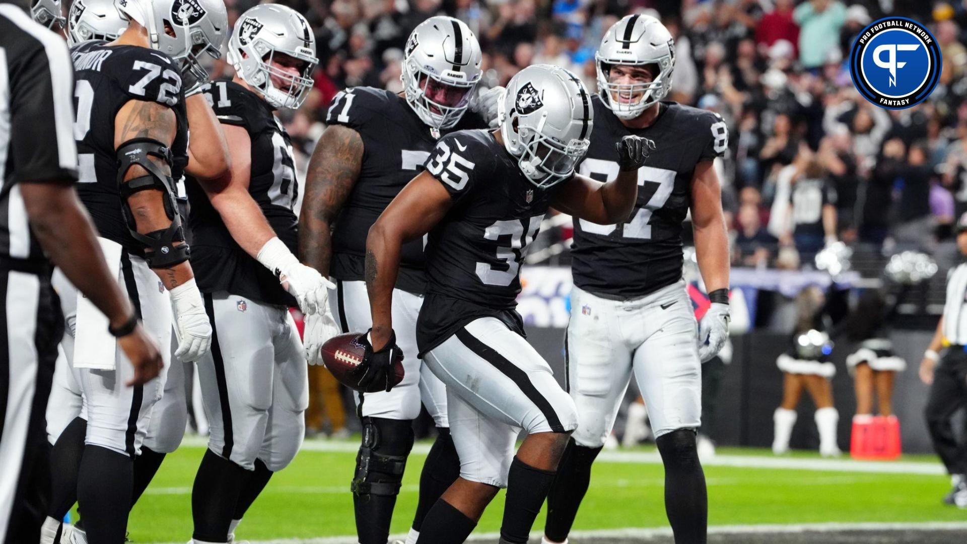 Las Vegas Raiders running back Zamir White (35) celebrates after scoring a touchdown against the Los Angeles Chargers in the first quarter at Allegiant Stadium.