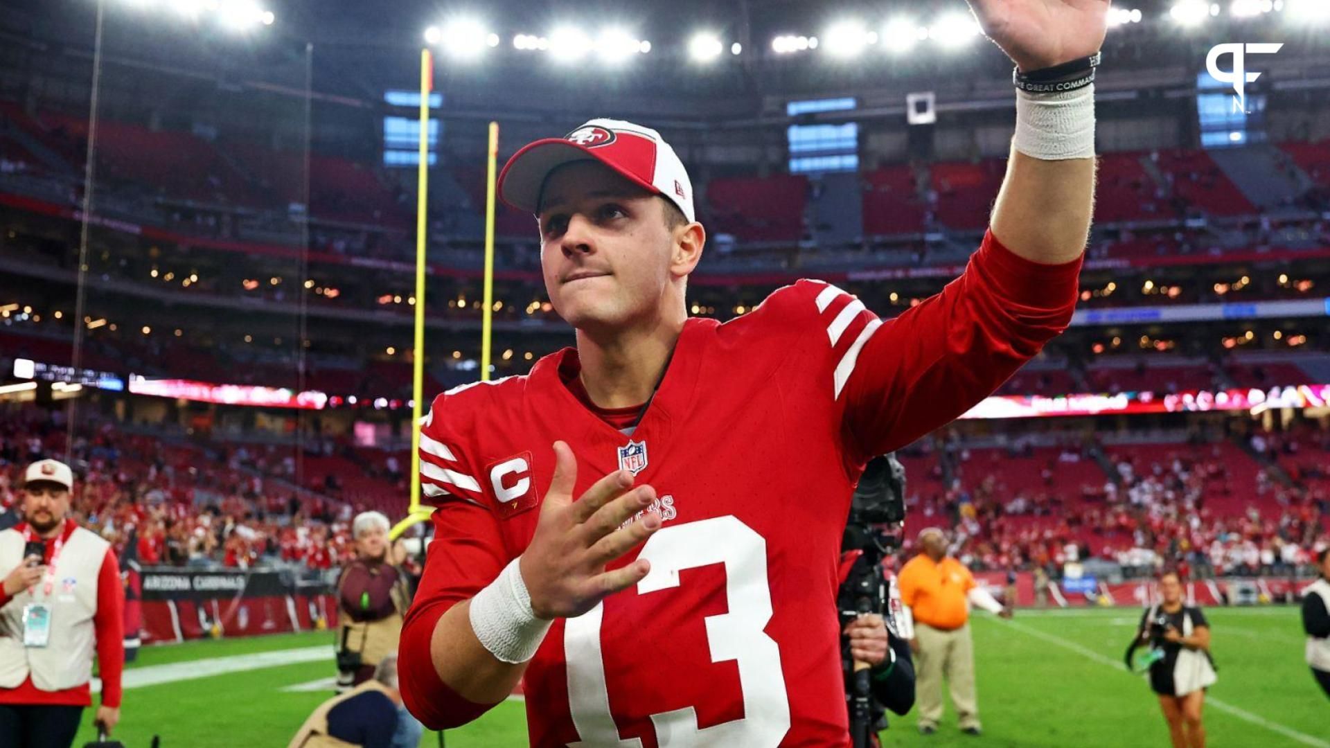 San Francisco 49ers quarterback Brock Purdy (13) celebrates after beating the Arizona Cardinals at State Farm Stadium.