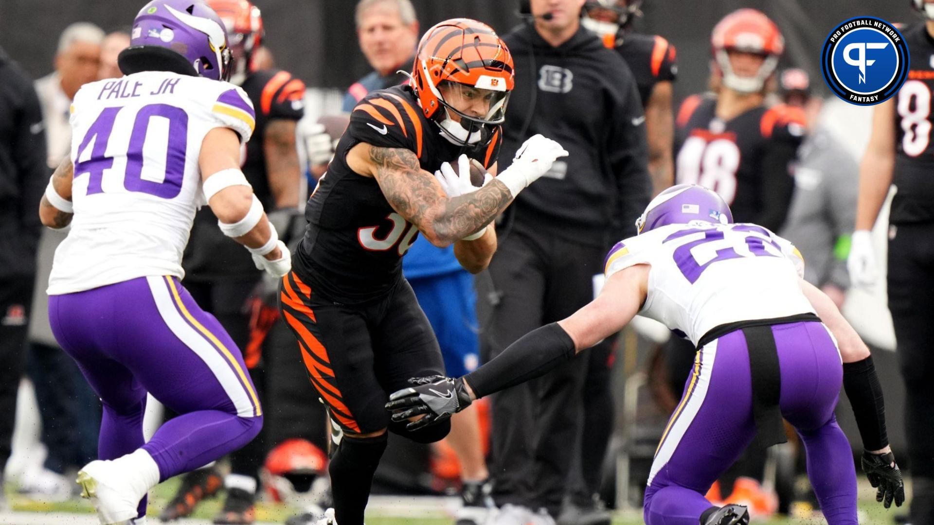 Cincinnati Bengals running back Chase Brown (30) carries the ball on a catch out of the backfield in the second quarter.