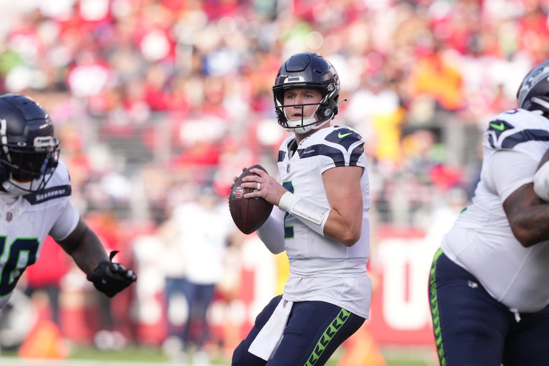 Seattle Seahawks QB Drew Lock (2) drops back to pass against the San Francisco 49ers.