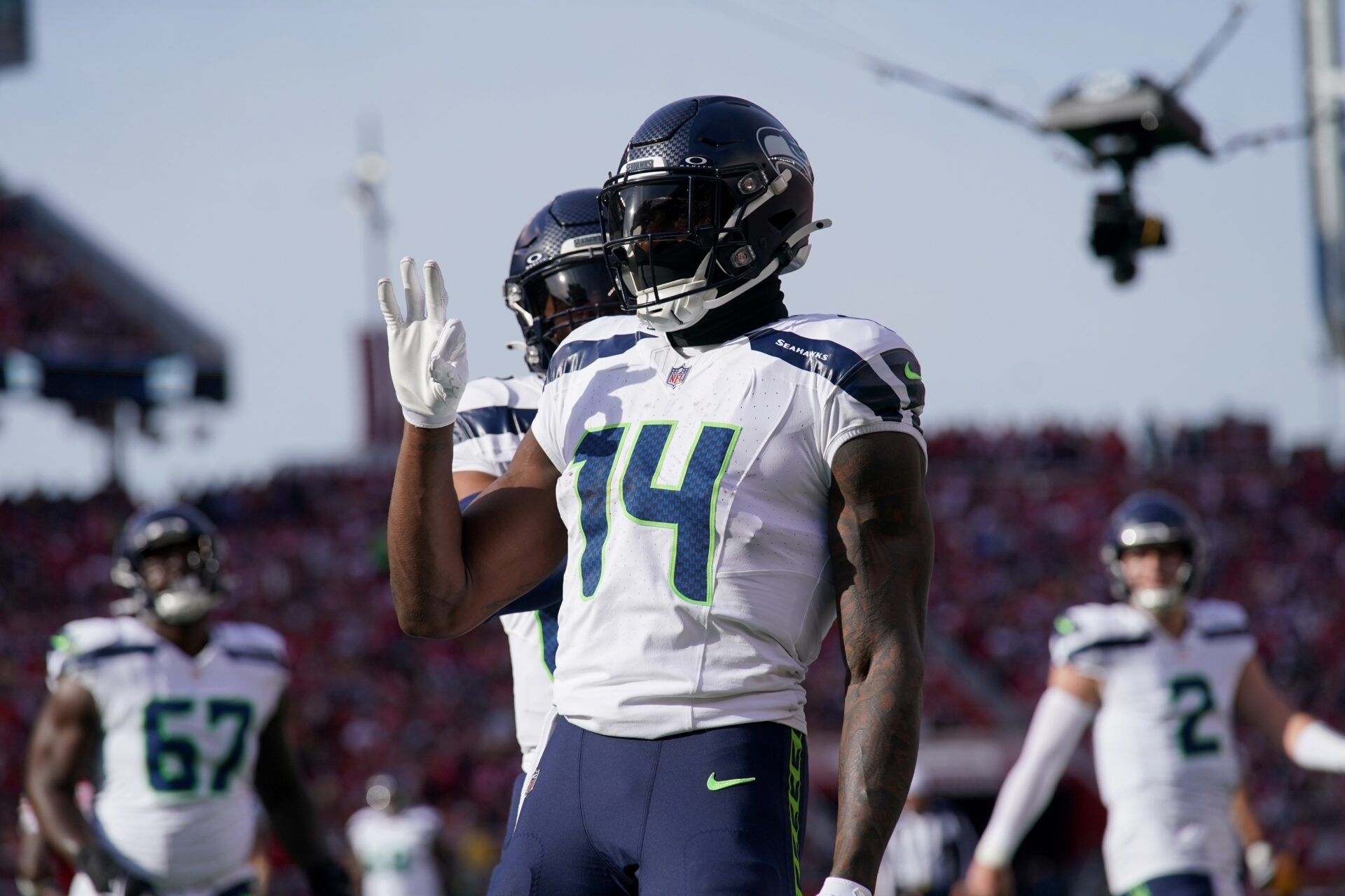 Seattle Seahawks wide receiver DK Metcalf (14) reacts after catching a touchdown against the San Francisco 49ers in the first quarter at Levi's Stadium.