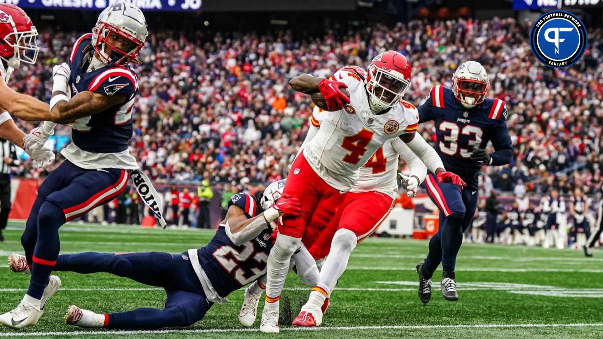 Kansas City Chiefs wide receiver Rashee Rice (4) runs the ball against the New England Patriots in the second quarter at Gillette Stadium.