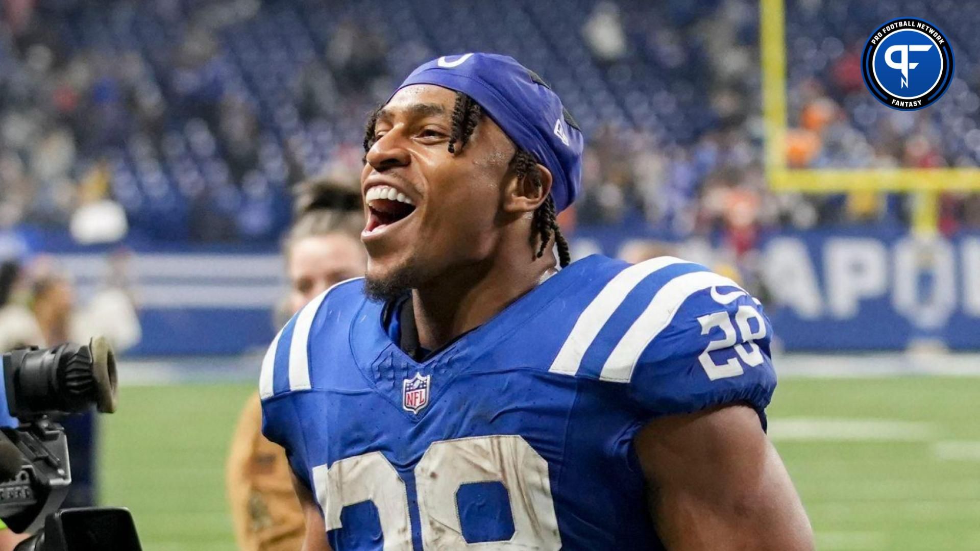 Indianapolis Colts running back Jonathan Taylor (28) smiles as he leaves the field Sunday, Nov. 26, 2023, after defeating the Tampa Bay Buccaneers at Lucas Oil Stadium in Indianapolis.