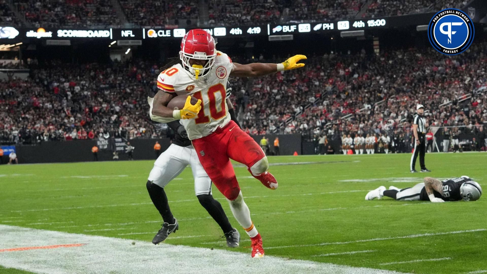 Kansas City Chiefs running back Isiah Pacheco (10) carries the ball against the Las Vegas Raiders in the second half at Allegiant Stadium.