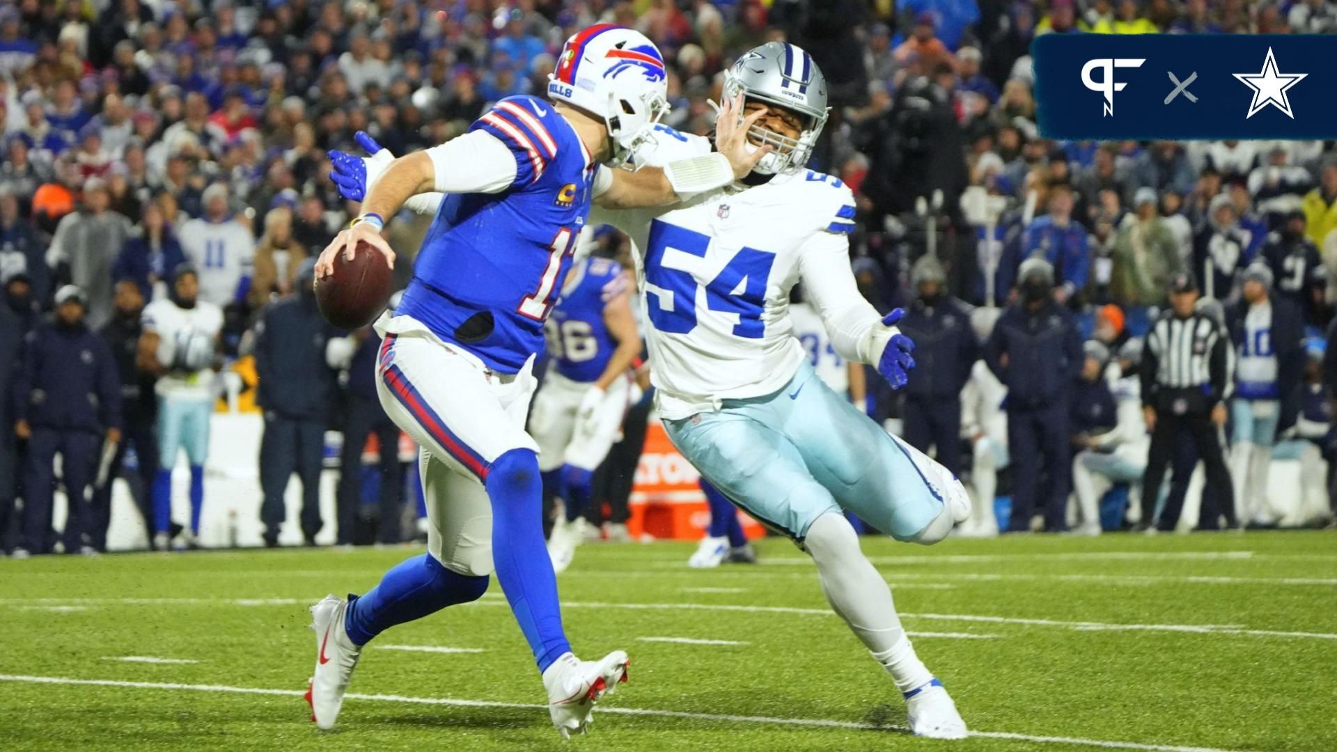 Buffalo Bills quarterback Josh Allen (17) attempts to block Dallas Cowboys defensive end Sam Williams (54) in the first half at Highmark Stadium.